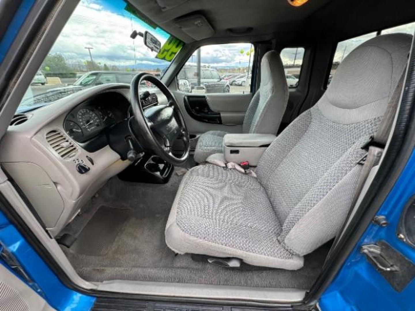 1999 Bright Atlantic Blue Clearcoat Metallic /Medium Graphite Cloth Ford Ranger XL SuperCab 2WD (1FTYR14V0XT) with an 3.0L V6 OHV 12V FFV engine, 4-Speed Automatic transmission, located at 1865 East Red Hills Pkwy, St. George, 84770, (435) 628-0023, 37.120850, -113.543640 - Photo#9