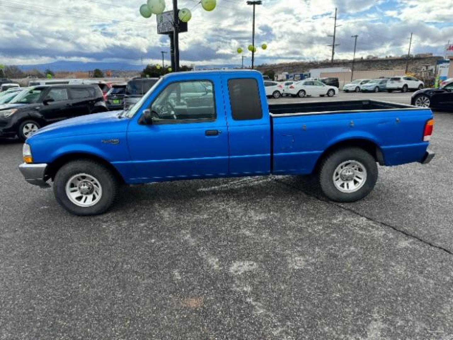 1999 Bright Atlantic Blue Clearcoat Metallic /Medium Graphite Cloth Ford Ranger XL SuperCab 2WD (1FTYR14V0XT) with an 3.0L V6 OHV 12V FFV engine, 4-Speed Automatic transmission, located at 1865 East Red Hills Pkwy, St. George, 84770, (435) 628-0023, 37.120850, -113.543640 - Photo#3