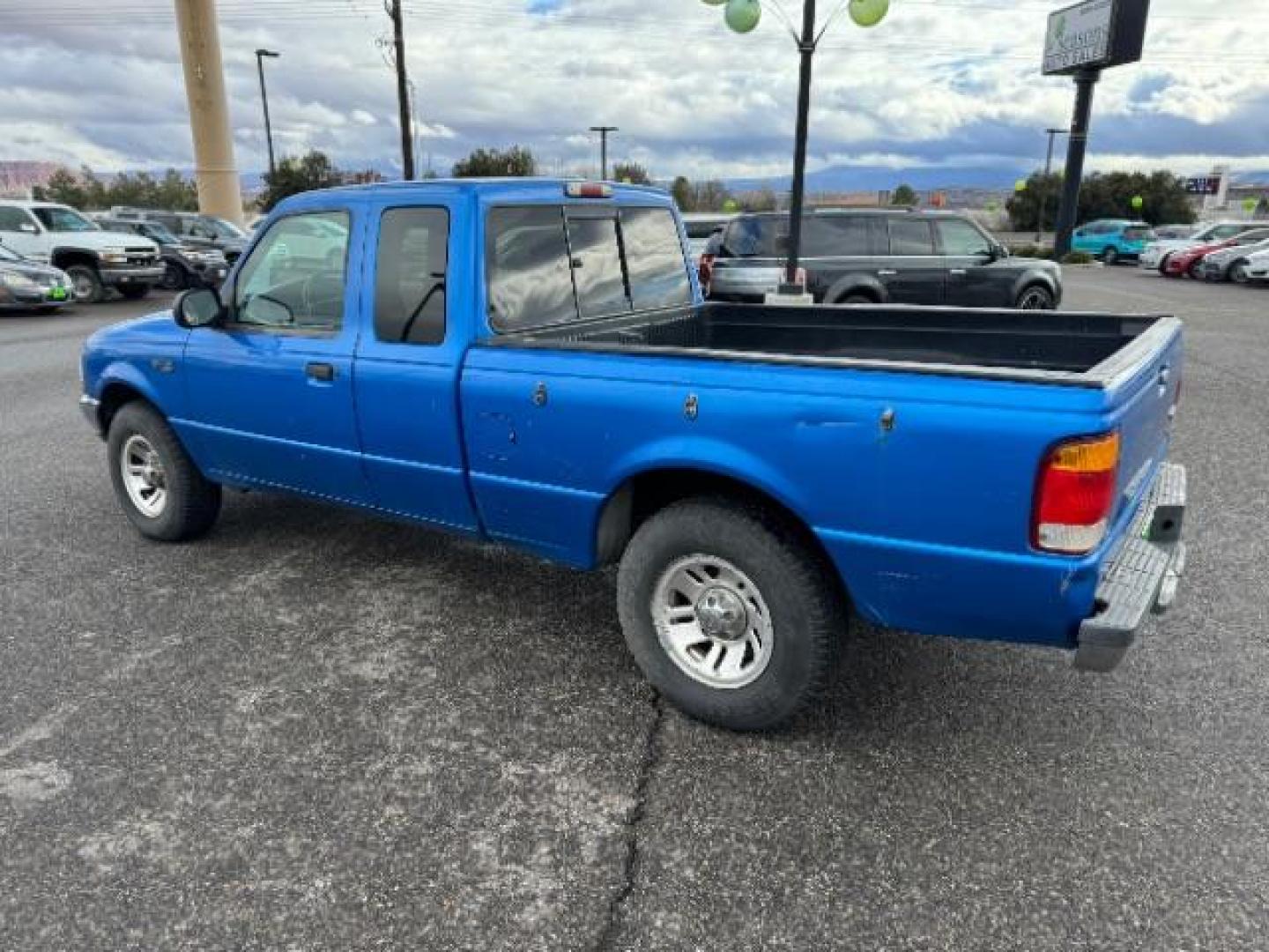 1999 Bright Atlantic Blue Clearcoat Metallic /Medium Graphite Cloth Ford Ranger XL SuperCab 2WD (1FTYR14V0XT) with an 3.0L V6 OHV 12V FFV engine, 4-Speed Automatic transmission, located at 1865 East Red Hills Pkwy, St. George, 84770, (435) 628-0023, 37.120850, -113.543640 - Photo#4