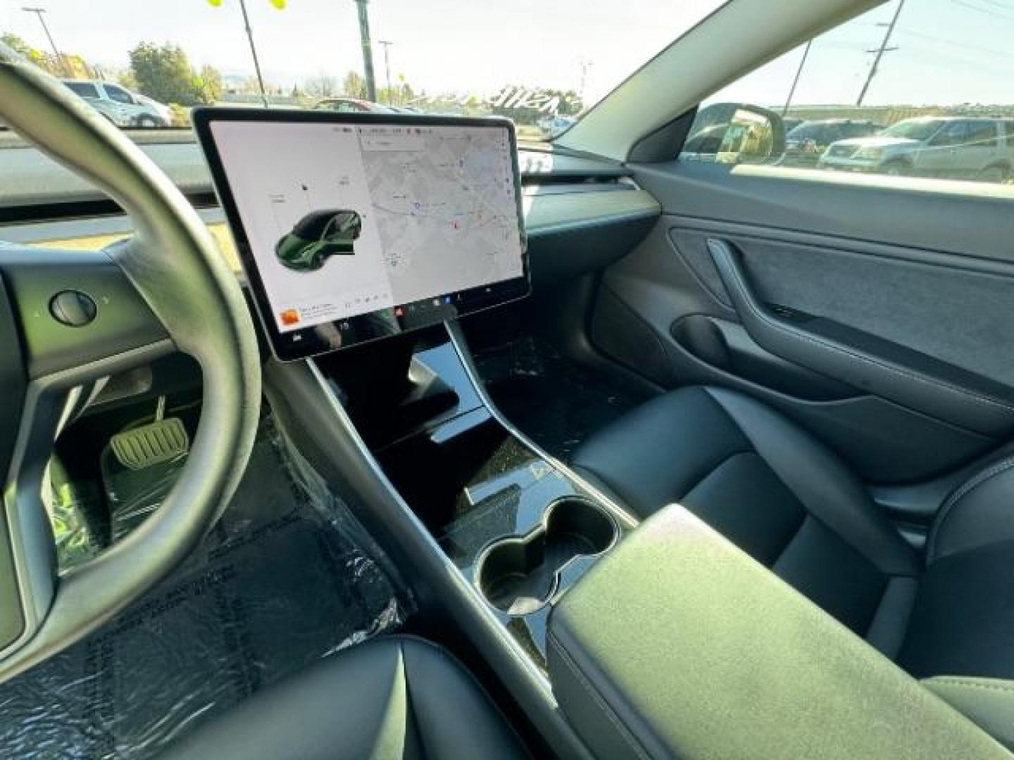 2018 Black Tesla Model 3 Long Range (5YJ3E1EA3JF) with an ELECTRIC engine, 1-Speed Automatic transmission, located at 1865 East Red Hills Pkwy, St. George, 84770, (435) 628-0023, 37.120850, -113.543640 - Photo#22