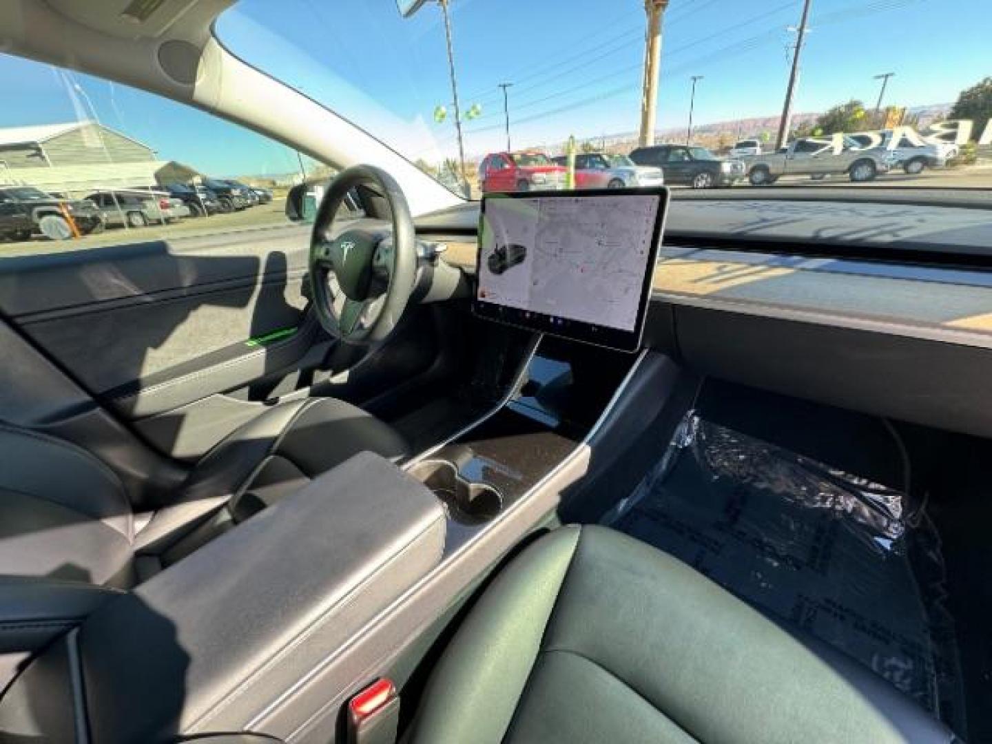 2018 Black Tesla Model 3 Long Range (5YJ3E1EA3JF) with an ELECTRIC engine, 1-Speed Automatic transmission, located at 1865 East Red Hills Pkwy, St. George, 84770, (435) 628-0023, 37.120850, -113.543640 - Photo#36