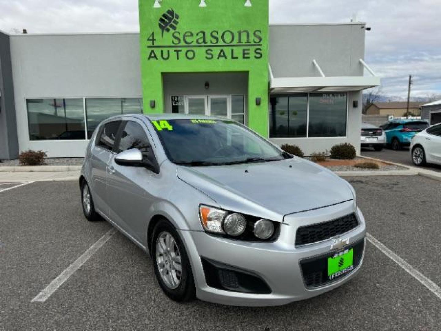 2014 Silver Ice Metallic /Dark Pewter/Dark Titanium Chevrolet Sonic LT Auto 5-Door (1G1JC6SH0E4) with an 1.8L L4 DOHC 24V engine, 6-Speed Automatic transmission, located at 1865 East Red Hills Pkwy, St. George, 84770, (435) 628-0023, 37.120850, -113.543640 - Photo#0