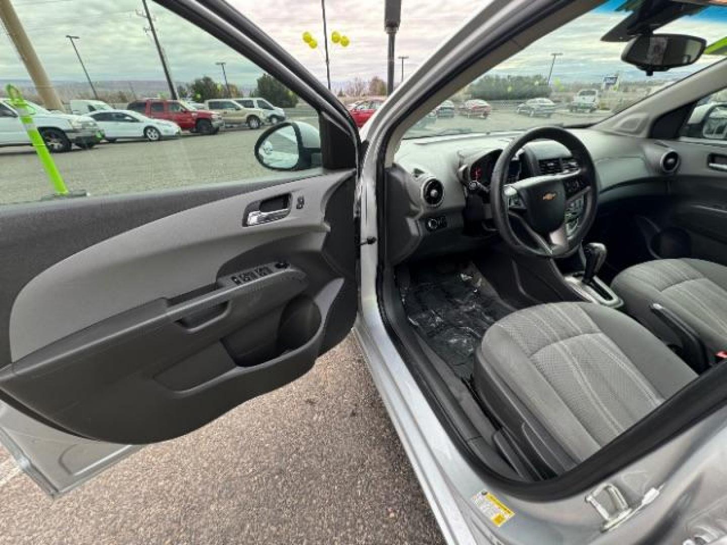 2014 Silver Ice Metallic /Dark Pewter/Dark Titanium Chevrolet Sonic LT Auto 5-Door (1G1JC6SH0E4) with an 1.8L L4 DOHC 24V engine, 6-Speed Automatic transmission, located at 1865 East Red Hills Pkwy, St. George, 84770, (435) 628-0023, 37.120850, -113.543640 - Photo#16