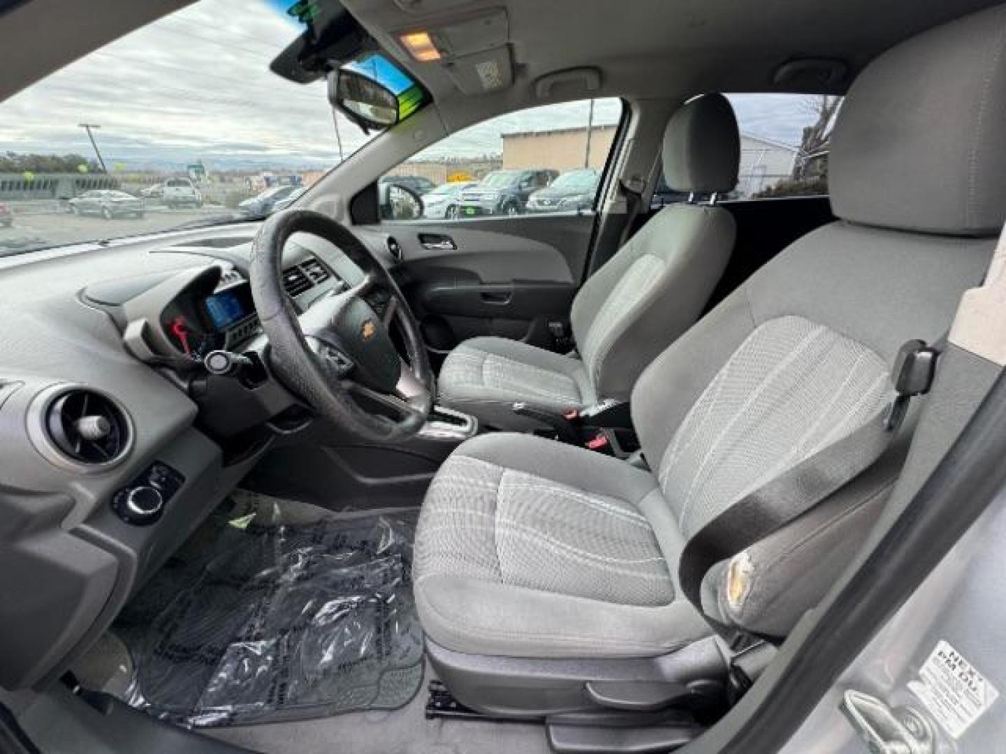 2014 Silver Ice Metallic /Dark Pewter/Dark Titanium Chevrolet Sonic LT Auto 5-Door (1G1JC6SH0E4) with an 1.8L L4 DOHC 24V engine, 6-Speed Automatic transmission, located at 1865 East Red Hills Pkwy, St. George, 84770, (435) 628-0023, 37.120850, -113.543640 - Photo#18