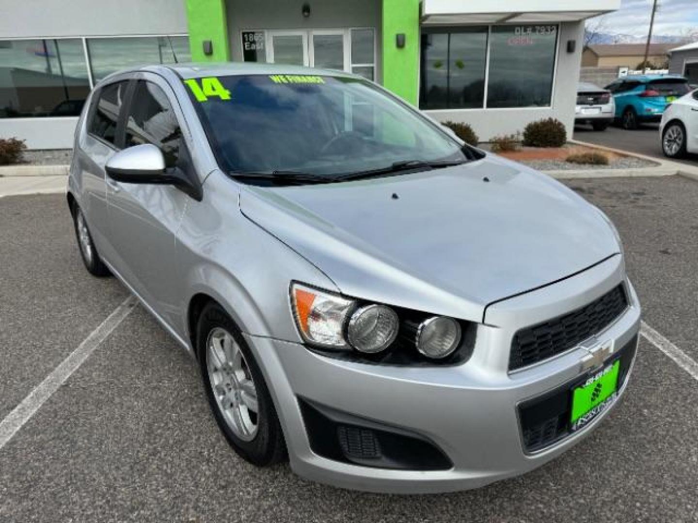 2014 Silver Ice Metallic /Dark Pewter/Dark Titanium Chevrolet Sonic LT Auto 5-Door (1G1JC6SH0E4) with an 1.8L L4 DOHC 24V engine, 6-Speed Automatic transmission, located at 1865 East Red Hills Pkwy, St. George, 84770, (435) 628-0023, 37.120850, -113.543640 - Photo#1