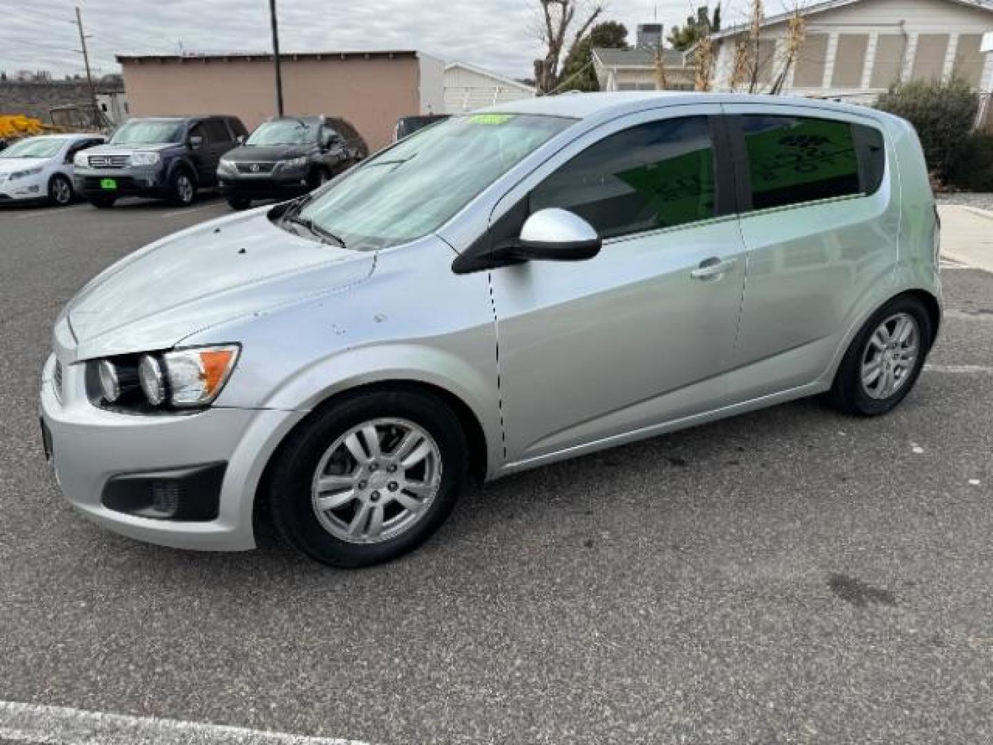 2014 Silver Ice Metallic /Dark Pewter/Dark Titanium Chevrolet Sonic LT Auto 5-Door (1G1JC6SH0E4) with an 1.8L L4 DOHC 24V engine, 6-Speed Automatic transmission, located at 1865 East Red Hills Pkwy, St. George, 84770, (435) 628-0023, 37.120850, -113.543640 - Photo#4