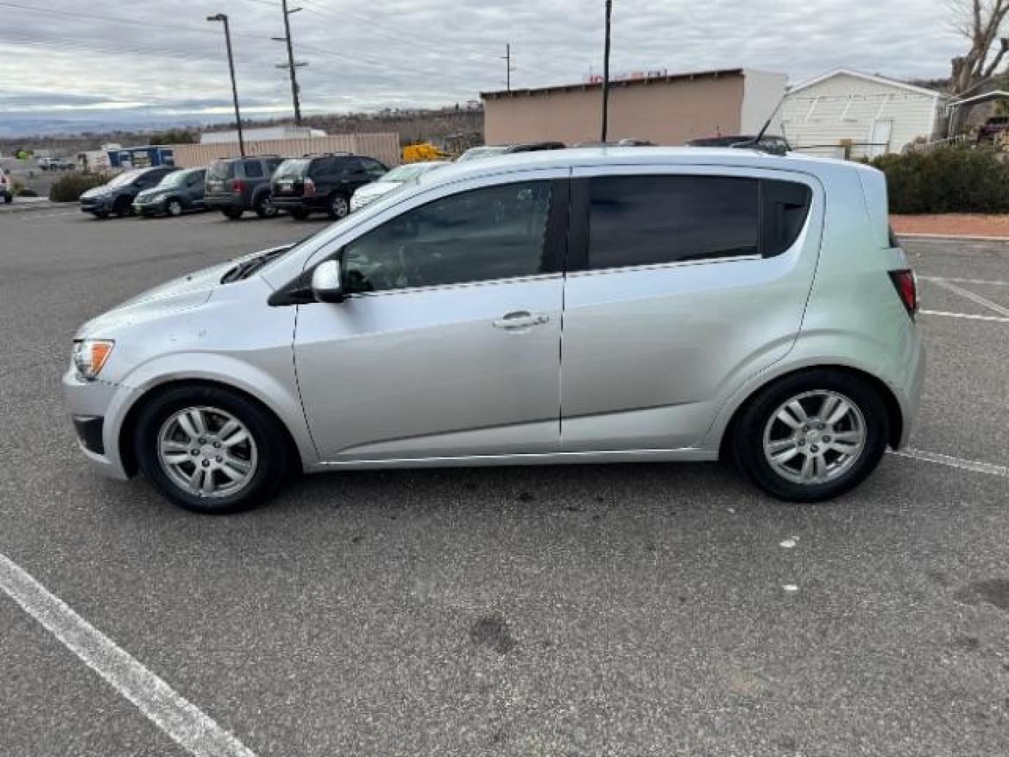 2014 Silver Ice Metallic /Dark Pewter/Dark Titanium Chevrolet Sonic LT Auto 5-Door (1G1JC6SH0E4) with an 1.8L L4 DOHC 24V engine, 6-Speed Automatic transmission, located at 1865 East Red Hills Pkwy, St. George, 84770, (435) 628-0023, 37.120850, -113.543640 - Photo#5