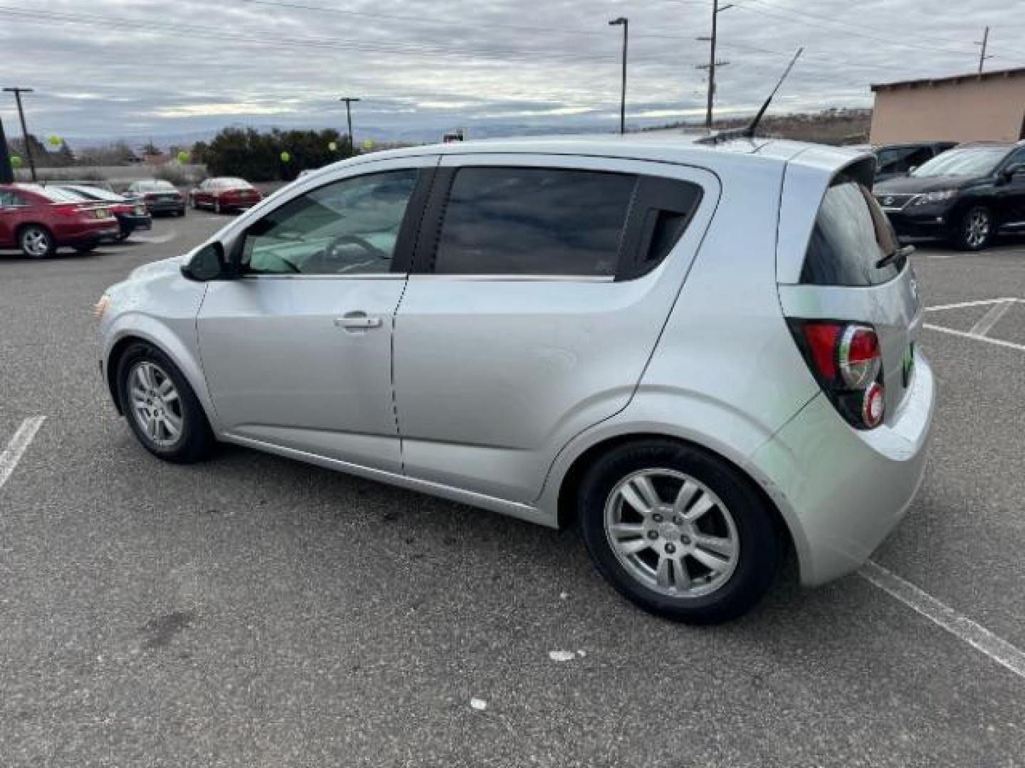 2014 Silver Ice Metallic /Dark Pewter/Dark Titanium Chevrolet Sonic LT Auto 5-Door (1G1JC6SH0E4) with an 1.8L L4 DOHC 24V engine, 6-Speed Automatic transmission, located at 1865 East Red Hills Pkwy, St. George, 84770, (435) 628-0023, 37.120850, -113.543640 - Photo#6