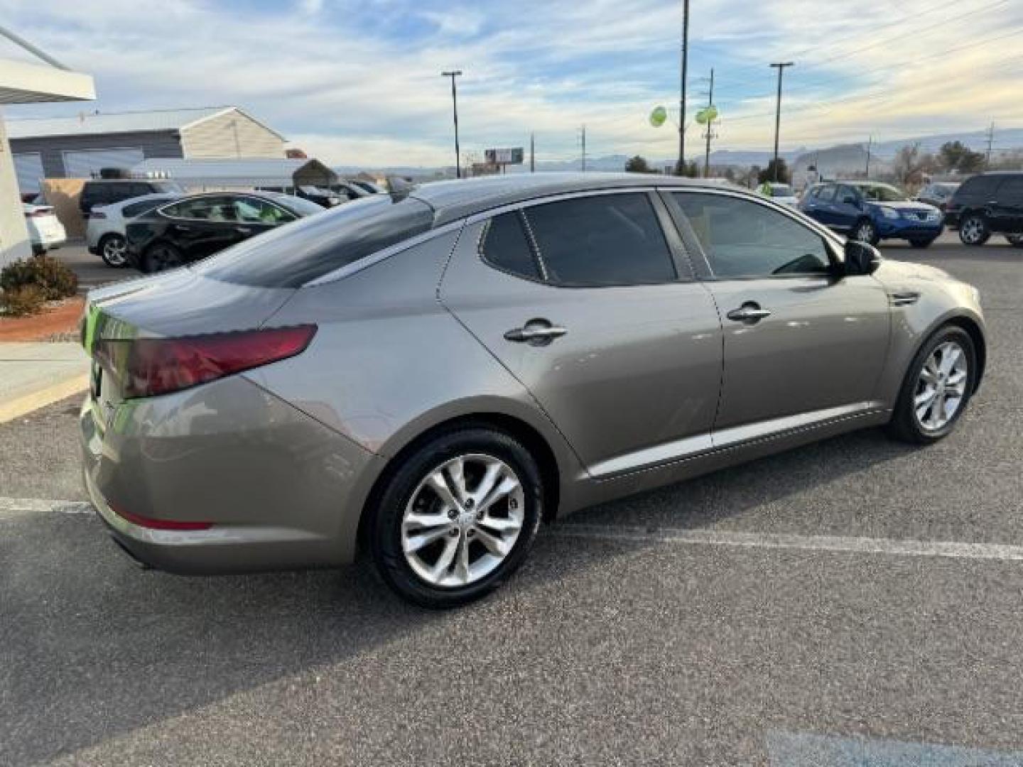 2013 Metal Bronze Pearl Metallic /Beige Leather Interior Kia Optima EX (5XXGN4A72DG) with an 2.4L L4 DOHC 16V engine, 6-Speed Automatic transmission, located at 1865 East Red Hills Pkwy, St. George, 84770, (435) 628-0023, 37.120850, -113.543640 - We specialize in helping ALL people get the best financing available. No matter your credit score, good, bad or none we can get you an amazing rate. Had a bankruptcy, divorce, or repossessions? We give you the green light to get your credit back on the road. Low down and affordable payments that fit - Photo#10