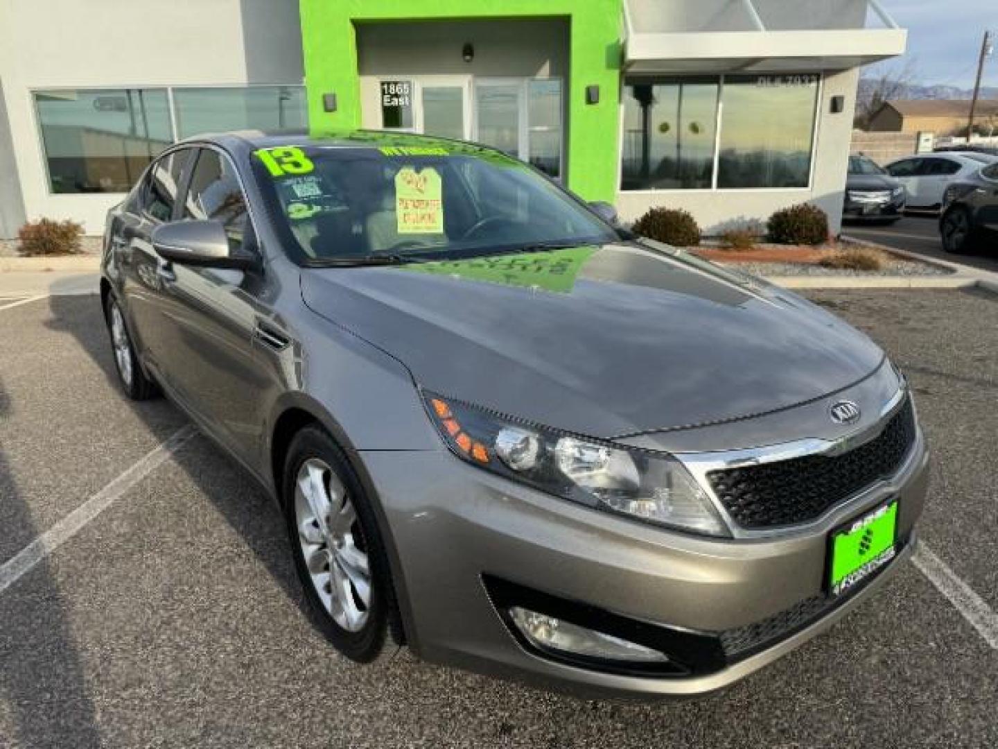 2013 Metal Bronze Pearl Metallic /Beige Leather Interior Kia Optima EX (5XXGN4A72DG) with an 2.4L L4 DOHC 16V engine, 6-Speed Automatic transmission, located at 1865 East Red Hills Pkwy, St. George, 84770, (435) 628-0023, 37.120850, -113.543640 - We specialize in helping ALL people get the best financing available. No matter your credit score, good, bad or none we can get you an amazing rate. Had a bankruptcy, divorce, or repossessions? We give you the green light to get your credit back on the road. Low down and affordable payments that fit - Photo#1