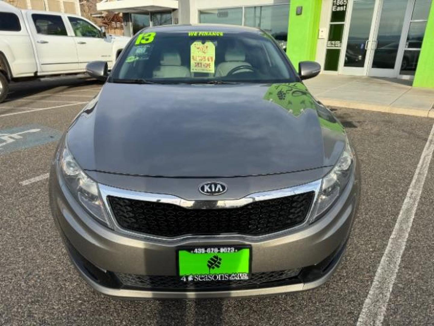 2013 Metal Bronze Pearl Metallic /Beige Leather Interior Kia Optima EX (5XXGN4A72DG) with an 2.4L L4 DOHC 16V engine, 6-Speed Automatic transmission, located at 1865 East Red Hills Pkwy, St. George, 84770, (435) 628-0023, 37.120850, -113.543640 - We specialize in helping ALL people get the best financing available. No matter your credit score, good, bad or none we can get you an amazing rate. Had a bankruptcy, divorce, or repossessions? We give you the green light to get your credit back on the road. Low down and affordable payments that fit - Photo#2