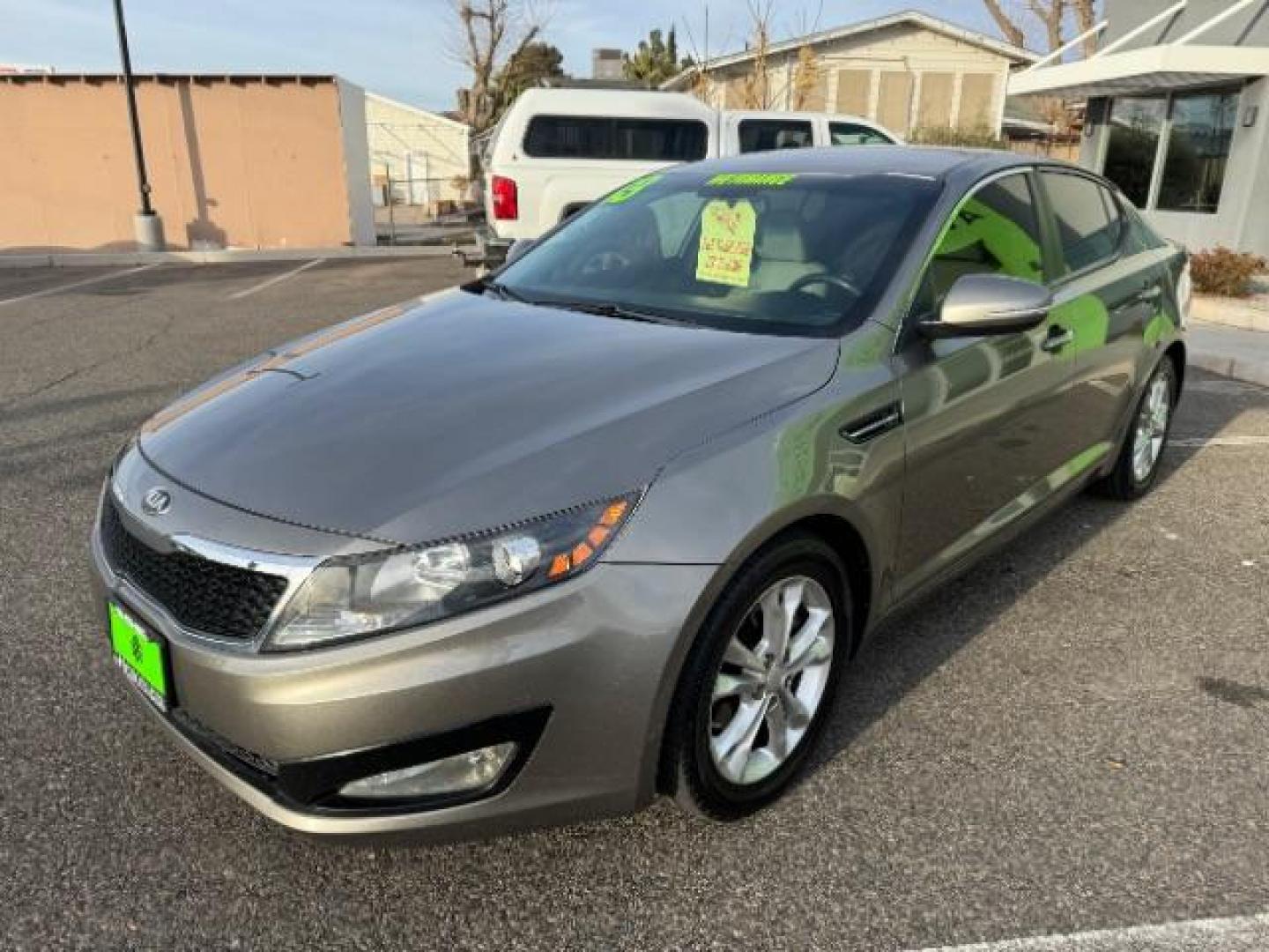 2013 Metal Bronze Pearl Metallic /Beige Leather Interior Kia Optima EX (5XXGN4A72DG) with an 2.4L L4 DOHC 16V engine, 6-Speed Automatic transmission, located at 1865 East Red Hills Pkwy, St. George, 84770, (435) 628-0023, 37.120850, -113.543640 - We specialize in helping ALL people get the best financing available. No matter your credit score, good, bad or none we can get you an amazing rate. Had a bankruptcy, divorce, or repossessions? We give you the green light to get your credit back on the road. Low down and affordable payments that fit - Photo#3