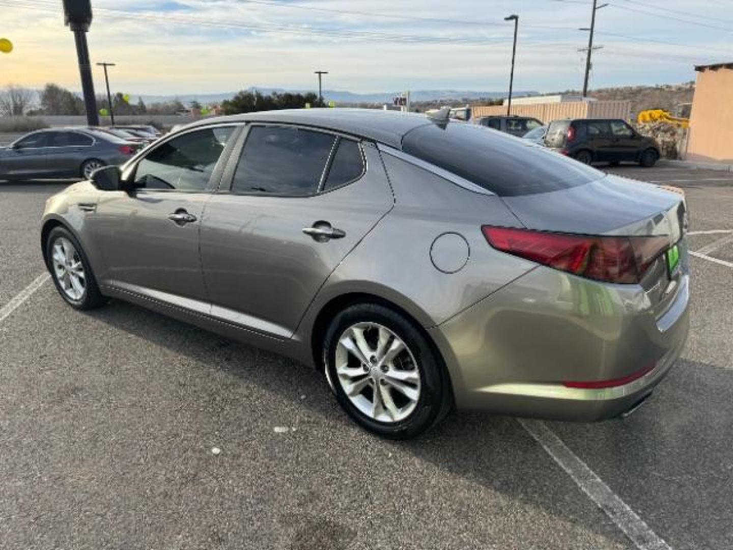 2013 Metal Bronze Pearl Metallic /Beige Leather Interior Kia Optima EX (5XXGN4A72DG) with an 2.4L L4 DOHC 16V engine, 6-Speed Automatic transmission, located at 1865 East Red Hills Pkwy, St. George, 84770, (435) 628-0023, 37.120850, -113.543640 - We specialize in helping ALL people get the best financing available. No matter your credit score, good, bad or none we can get you an amazing rate. Had a bankruptcy, divorce, or repossessions? We give you the green light to get your credit back on the road. Low down and affordable payments that fit - Photo#4