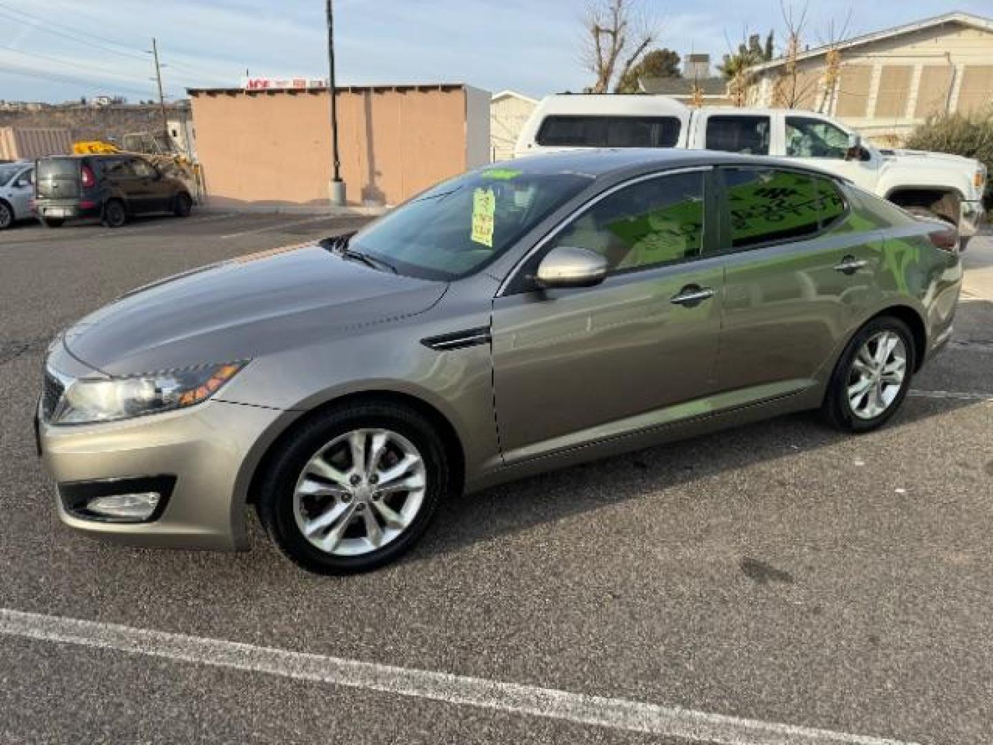 2013 Metal Bronze Pearl Metallic /Beige Leather Interior Kia Optima EX (5XXGN4A72DG) with an 2.4L L4 DOHC 16V engine, 6-Speed Automatic transmission, located at 1865 East Red Hills Pkwy, St. George, 84770, (435) 628-0023, 37.120850, -113.543640 - We specialize in helping ALL people get the best financing available. No matter your credit score, good, bad or none we can get you an amazing rate. Had a bankruptcy, divorce, or repossessions? We give you the green light to get your credit back on the road. Low down and affordable payments that fit - Photo#6