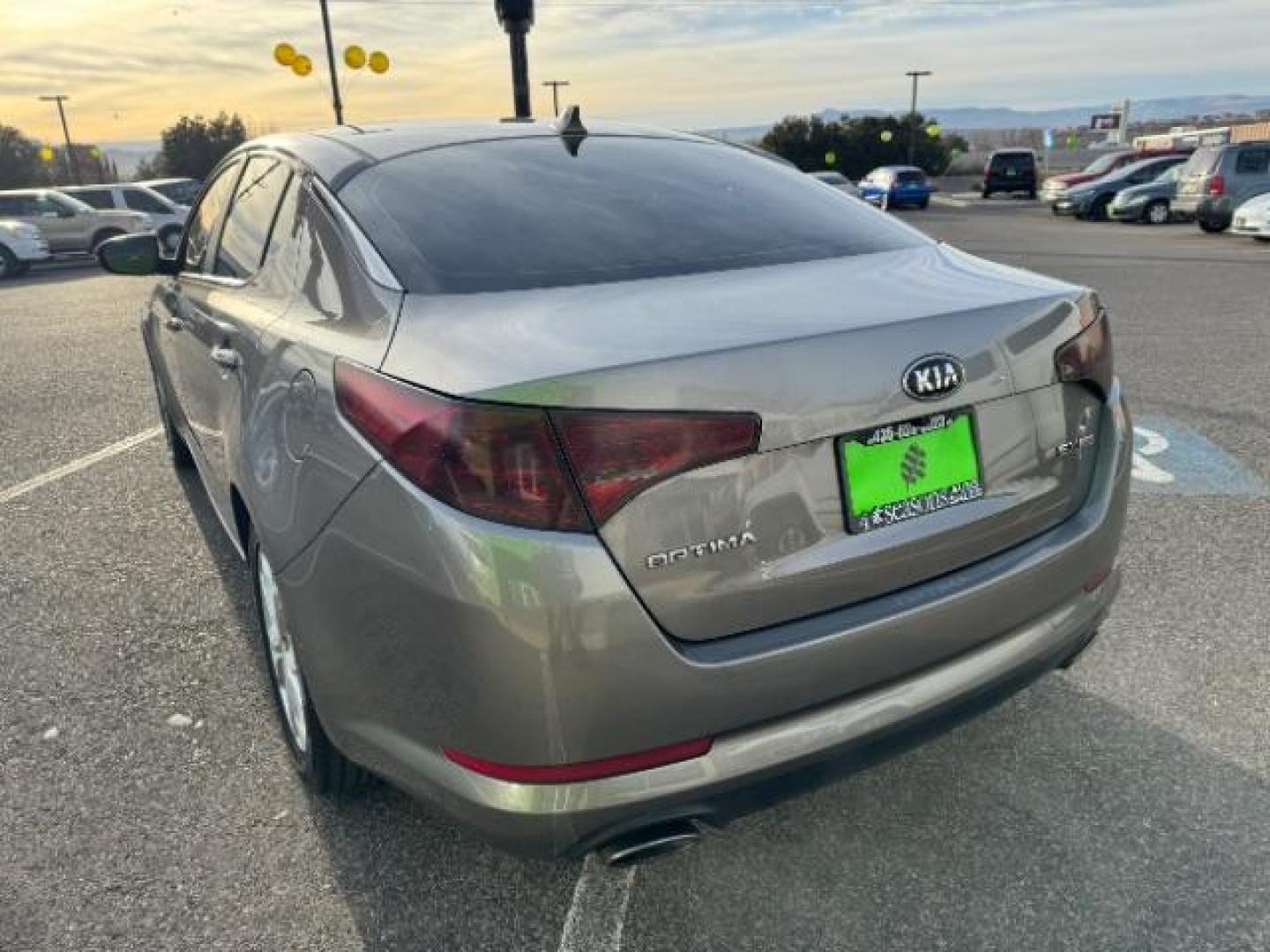 2013 Metal Bronze Pearl Metallic /Beige Leather Interior Kia Optima EX (5XXGN4A72DG) with an 2.4L L4 DOHC 16V engine, 6-Speed Automatic transmission, located at 1865 East Red Hills Pkwy, St. George, 84770, (435) 628-0023, 37.120850, -113.543640 - We specialize in helping ALL people get the best financing available. No matter your credit score, good, bad or none we can get you an amazing rate. Had a bankruptcy, divorce, or repossessions? We give you the green light to get your credit back on the road. Low down and affordable payments that fit - Photo#8