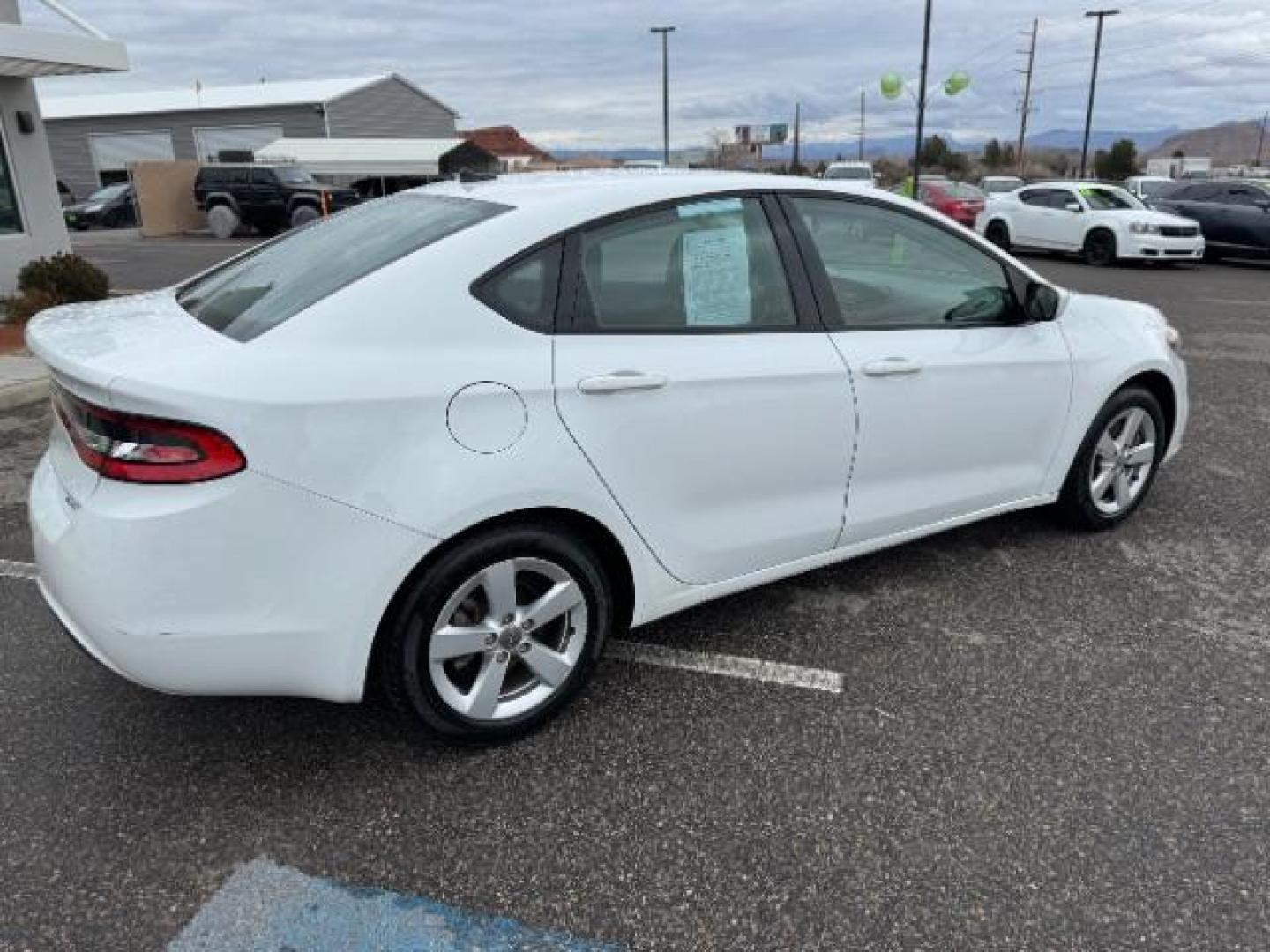 2016 White /Black, premium cloth Dodge Dart SXT (1C3CDFBB1GD) with an 2.4L L4 DOHC 16V engine, 6-Speed Automatic transmission, located at 940 North Main Street, Cedar City, UT, 84720, (435) 628-0023, 37.692936, -113.061897 - Photo#10