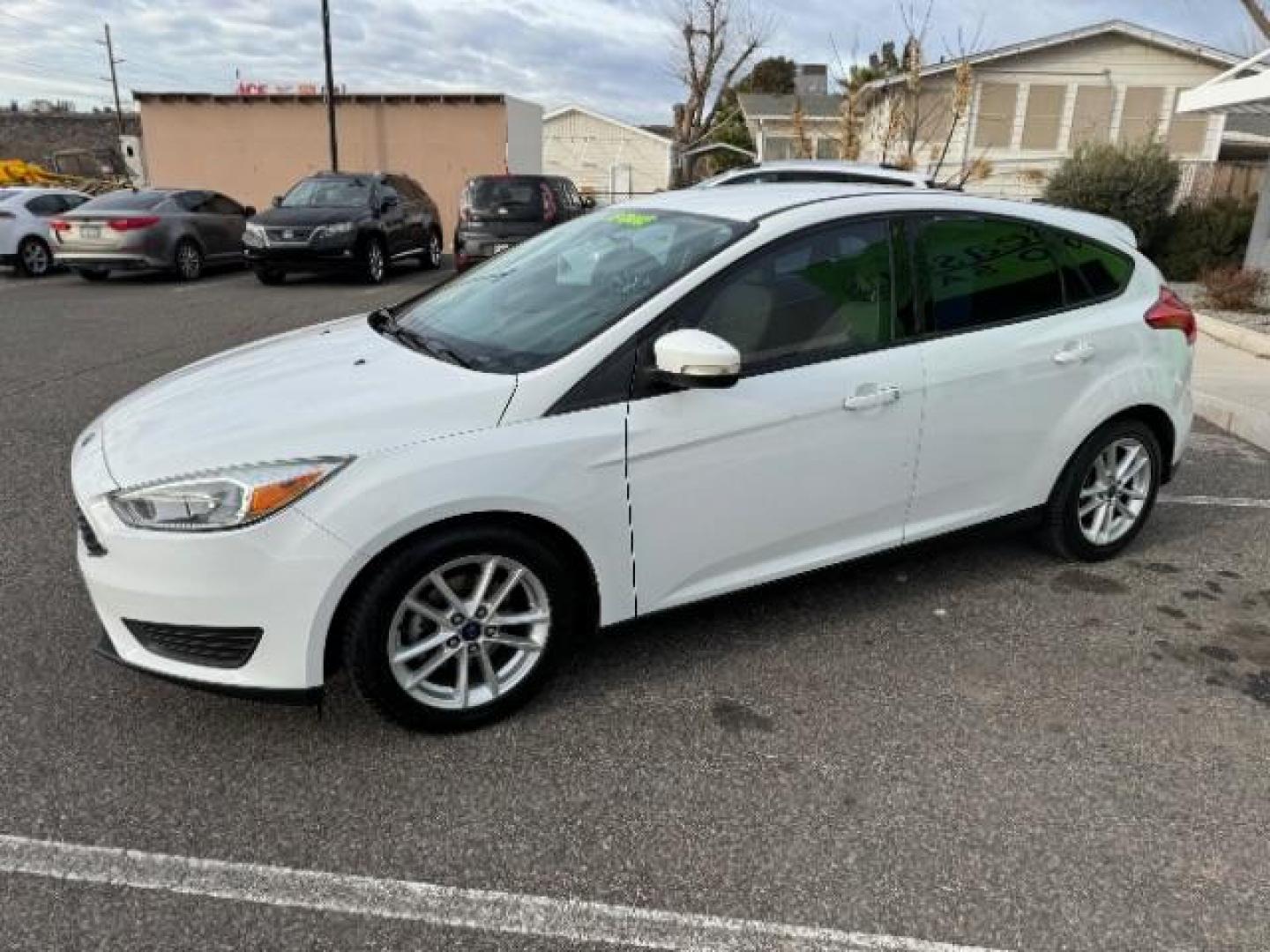 2015 Oxford White /Charcoal Black, leather Ford Focus SE Hatch (1FADP3K25FL) with an 2.0L L4 DOHC 16V engine, 5-Speed Manual transmission, located at 940 North Main Street, Cedar City, UT, 84720, (435) 628-0023, 37.692936, -113.061897 - We specialize in helping ALL people get the best financing available. No matter your credit score, good, bad or none we can get you an amazing rate. Had a bankruptcy, divorce, or repossessions? We give you the green light to get your credit back on the road. Low down and affordable payments that fit - Photo#4