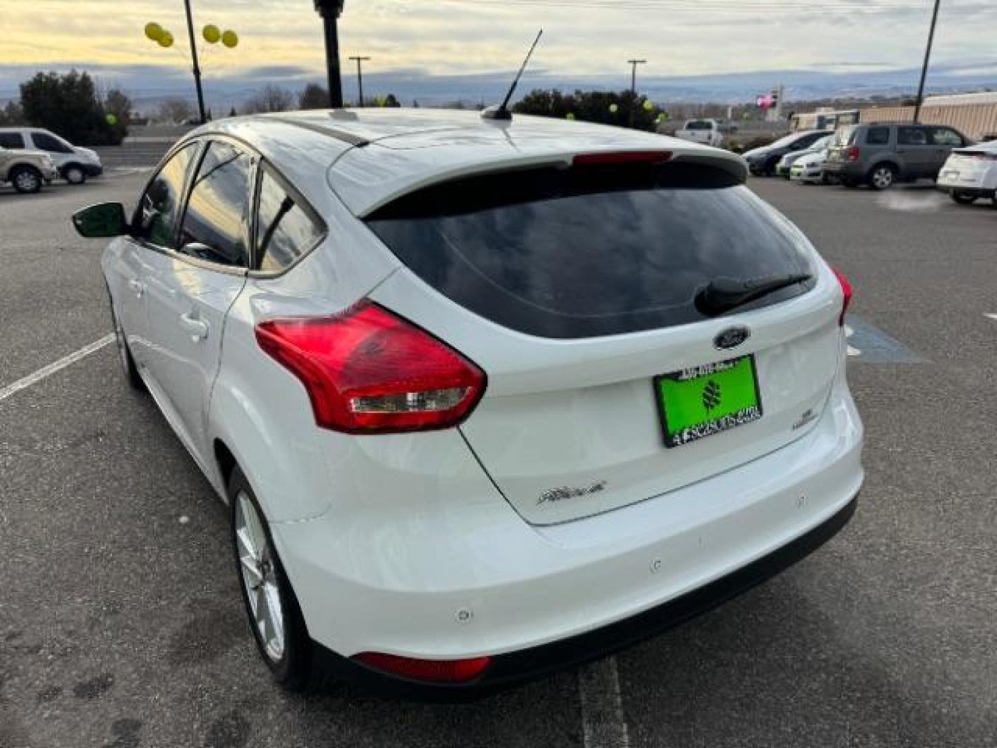 2015 Oxford White /Charcoal Black, leather Ford Focus SE Hatch (1FADP3K25FL) with an 2.0L L4 DOHC 16V engine, 5-Speed Manual transmission, located at 940 North Main Street, Cedar City, UT, 84720, (435) 628-0023, 37.692936, -113.061897 - We specialize in helping ALL people get the best financing available. No matter your credit score, good, bad or none we can get you an amazing rate. Had a bankruptcy, divorce, or repossessions? We give you the green light to get your credit back on the road. Low down and affordable payments that fit - Photo#7