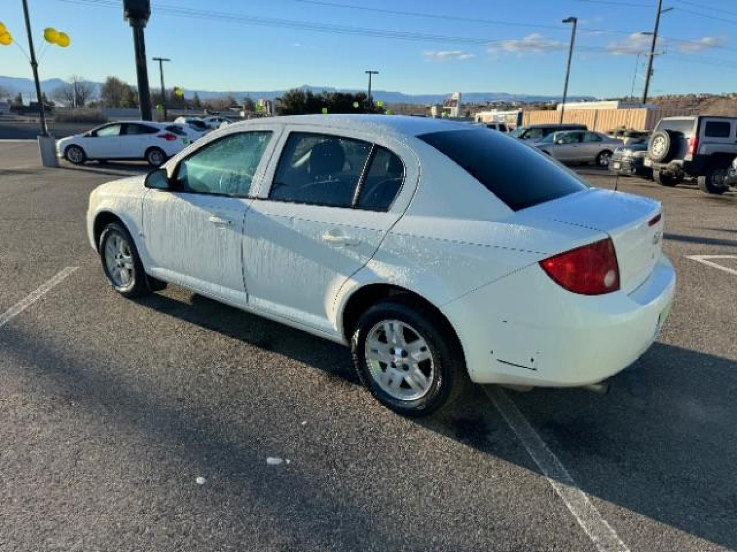 2006 Summit White /Neutral Cloth Interior Chevrolet Cobalt LS Sedan (1G1AK55F667) with an 2.2L L4 DOHC 16V engine, 4-Speed Automatic transmission, located at 940 North Main Street, Cedar City, UT, 84720, (435) 628-0023, 37.692936, -113.061897 - Photo#6