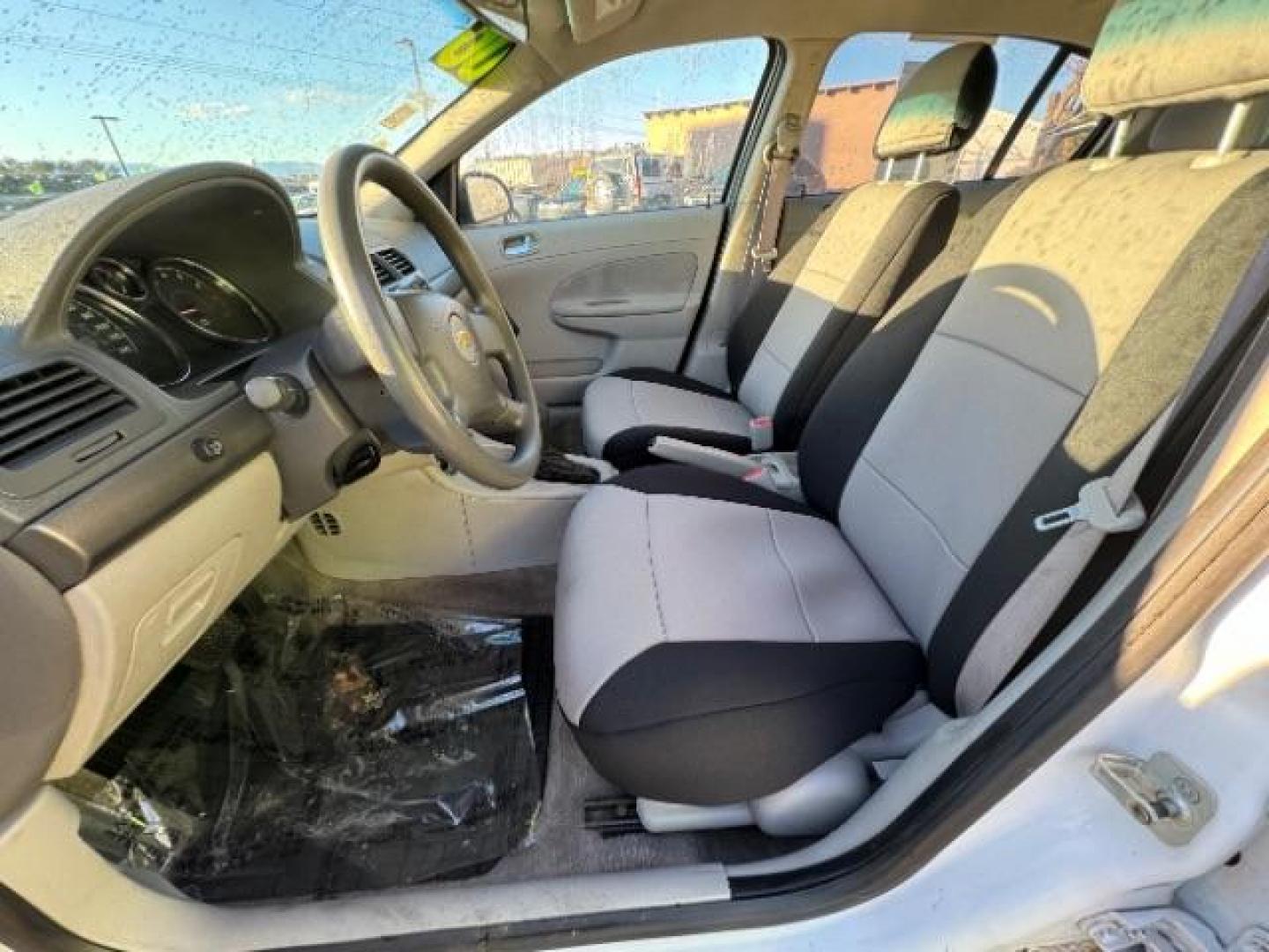 2006 Summit White /Neutral Cloth Interior Chevrolet Cobalt LS Sedan (1G1AK55F667) with an 2.2L L4 DOHC 16V engine, 4-Speed Automatic transmission, located at 940 North Main Street, Cedar City, UT, 84720, (435) 628-0023, 37.692936, -113.061897 - Photo#18