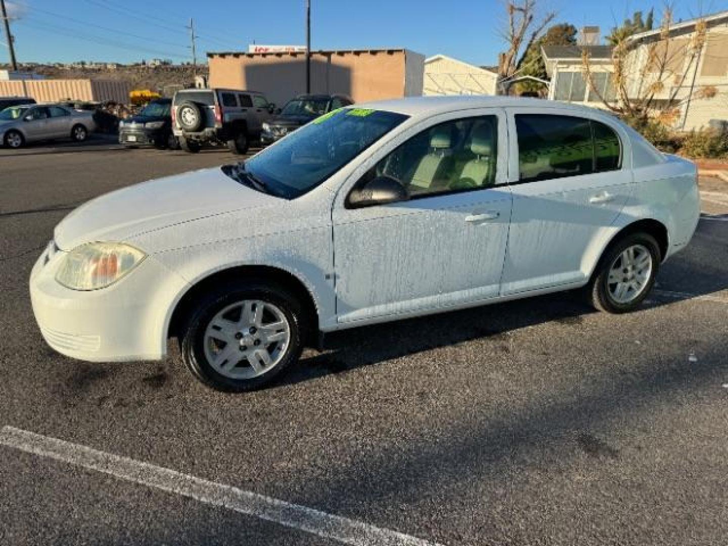 2006 Summit White /Neutral Cloth Interior Chevrolet Cobalt LS Sedan (1G1AK55F667) with an 2.2L L4 DOHC 16V engine, 4-Speed Automatic transmission, located at 940 North Main Street, Cedar City, UT, 84720, (435) 628-0023, 37.692936, -113.061897 - Photo#4