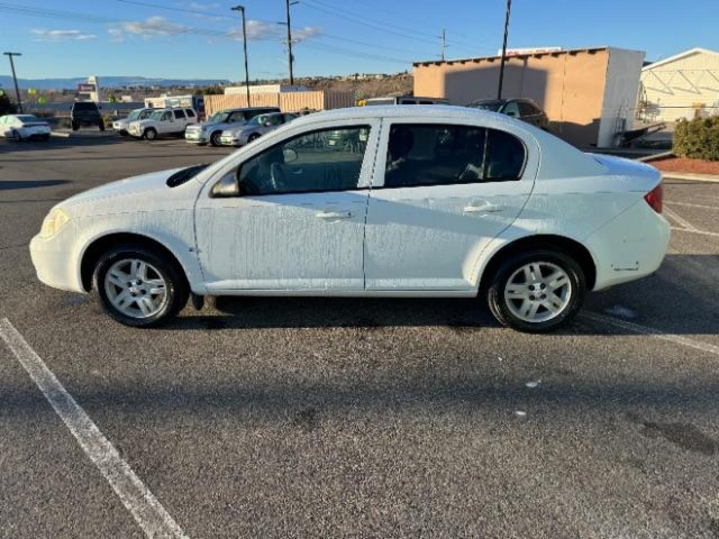 2006 Summit White /Neutral Cloth Interior Chevrolet Cobalt LS Sedan (1G1AK55F667) with an 2.2L L4 DOHC 16V engine, 4-Speed Automatic transmission, located at 940 North Main Street, Cedar City, UT, 84720, (435) 628-0023, 37.692936, -113.061897 - Photo#5