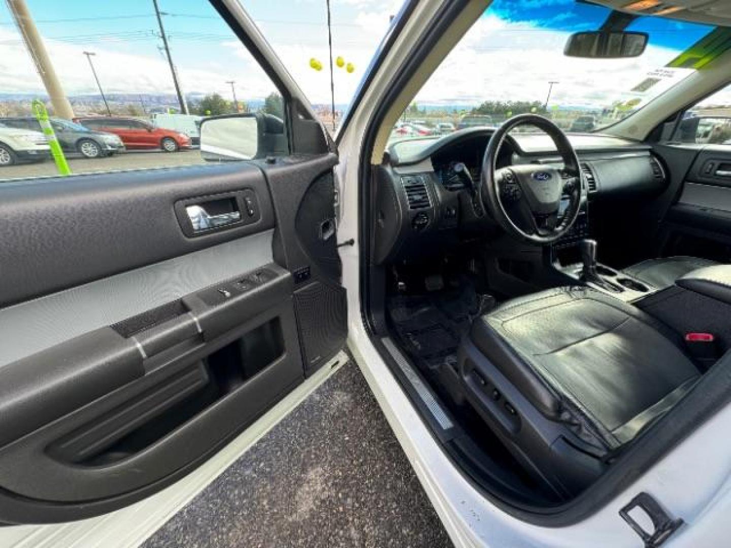 2014 White Platinum Met TC /Charcoal Black Ford Flex Limited AWD w/EcoBoost (2FMHK6DTXEB) with an 3.5L V6 DOHC 24V engine, 6-Speed Automatic Overdrive transmission, located at 1865 East Red Hills Pkwy, St. George, 84770, (435) 628-0023, 37.120850, -113.543640 - We specialize in helping ALL people get the best financing available. No matter your credit score, good, bad or none we can get you an amazing rate. Had a bankruptcy, divorce, or repossessions? We give you the green light to get your credit back on the road. Low down and affordable payments that fit - Photo#16