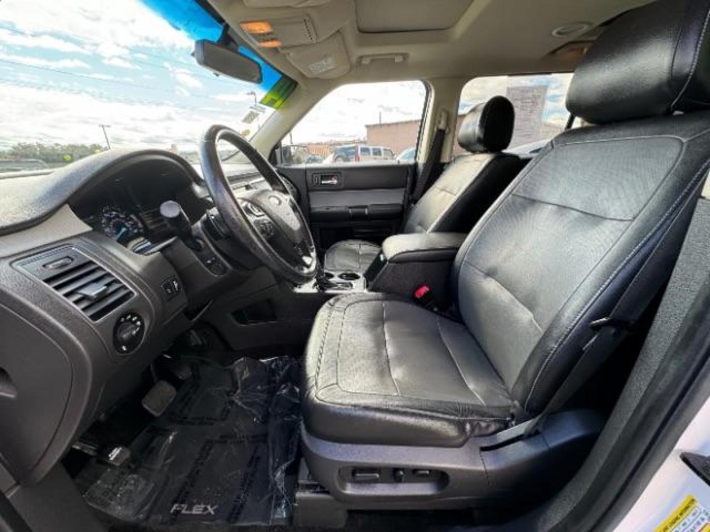 2014 White Platinum Met TC /Charcoal Black Ford Flex Limited AWD w/EcoBoost (2FMHK6DTXEB) with an 3.5L V6 DOHC 24V engine, 6-Speed Automatic Overdrive transmission, located at 1865 East Red Hills Pkwy, St. George, 84770, (435) 628-0023, 37.120850, -113.543640 - We specialize in helping ALL people get the best financing available. No matter your credit score, good, bad or none we can get you an amazing rate. Had a bankruptcy, divorce, or repossessions? We give you the green light to get your credit back on the road. Low down and affordable payments that fit - Photo#18