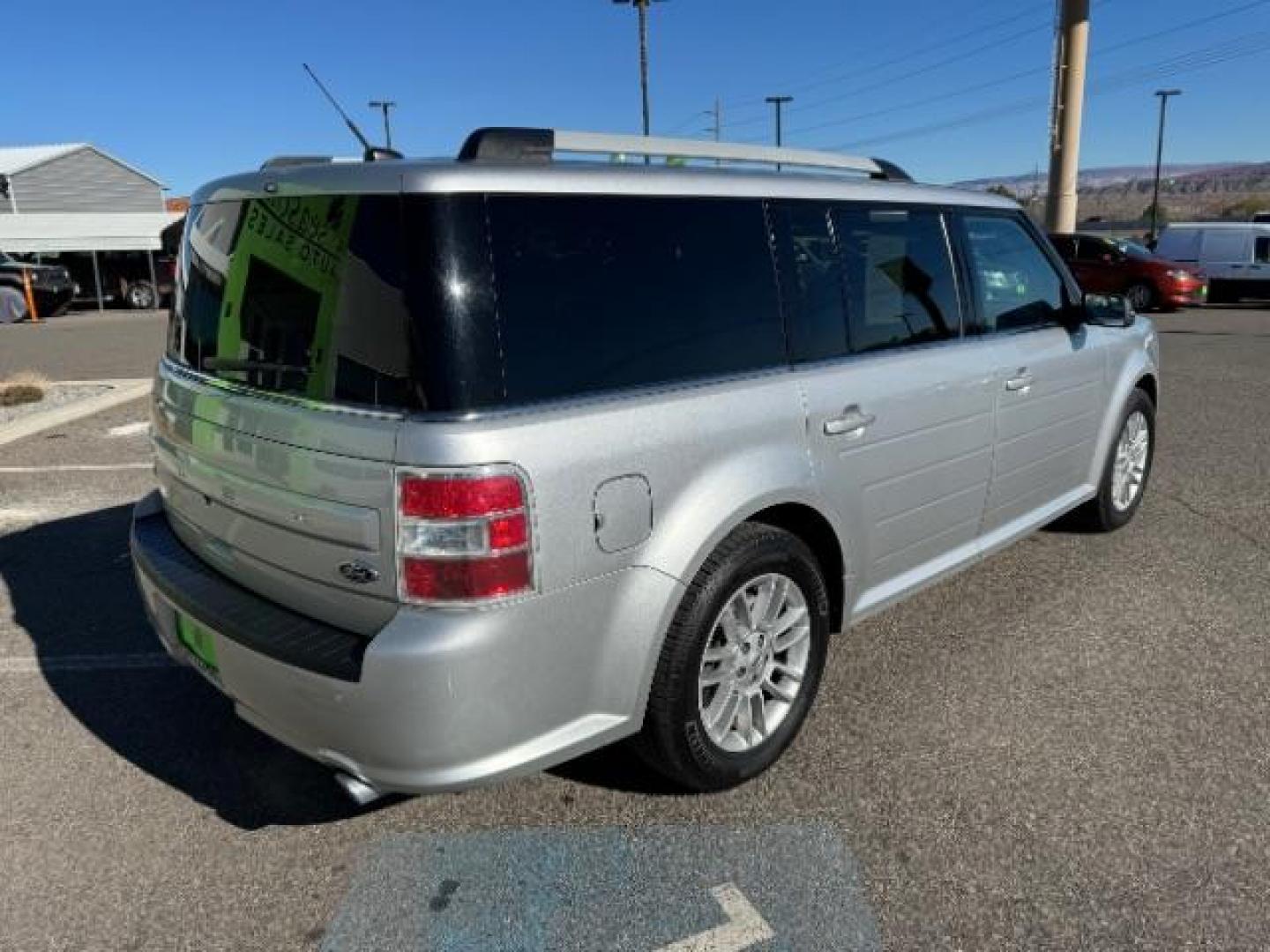 2014 Ingot Silver Metallic /Charcoal Black Ford Flex SEL FWD (2FMGK5C85EB) with an 3.5L V6 DOHC 24V engine, 6-Speed Automatic Overdrive transmission, located at 940 North Main Street, Cedar City, UT, 84720, (435) 628-0023, 37.692936, -113.061897 - Photo#9