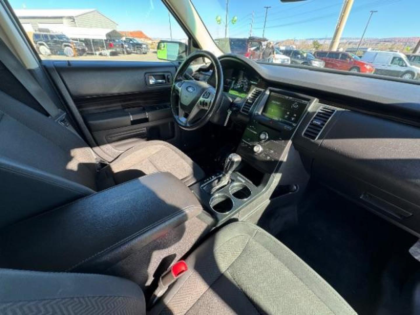 2014 Ingot Silver Metallic /Charcoal Black Ford Flex SEL FWD (2FMGK5C85EB) with an 3.5L V6 DOHC 24V engine, 6-Speed Automatic Overdrive transmission, located at 940 North Main Street, Cedar City, UT, 84720, (435) 628-0023, 37.692936, -113.061897 - Photo#39