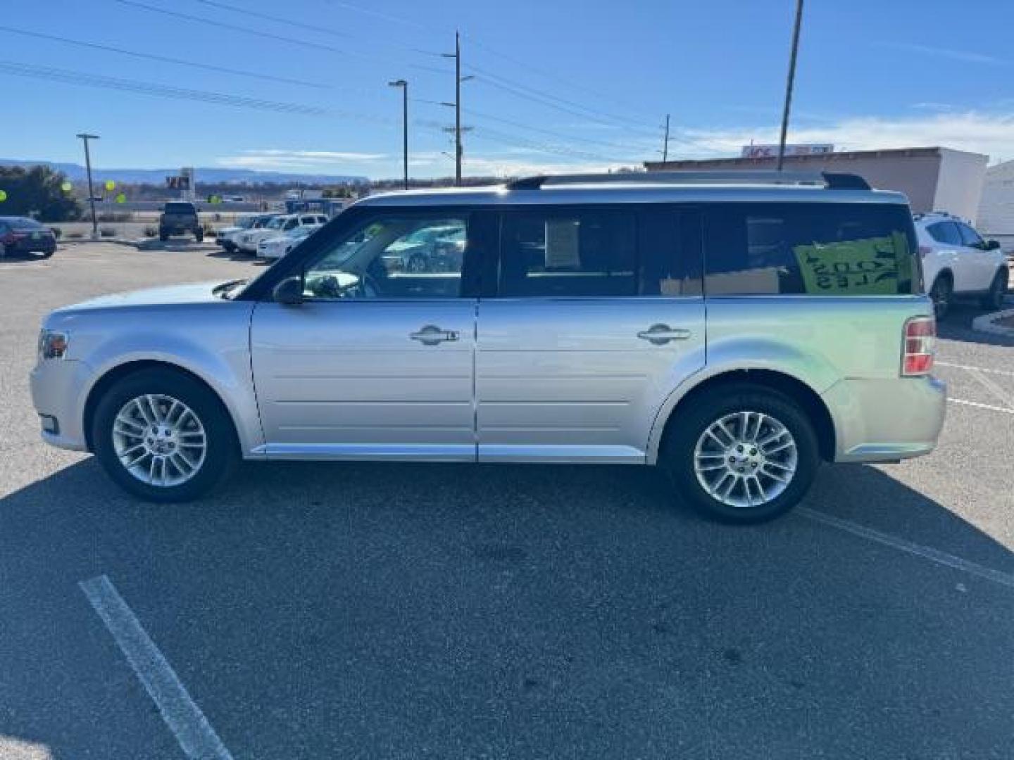 2014 Ingot Silver Metallic /Charcoal Black Ford Flex SEL FWD (2FMGK5C85EB) with an 3.5L V6 DOHC 24V engine, 6-Speed Automatic Overdrive transmission, located at 940 North Main Street, Cedar City, UT, 84720, (435) 628-0023, 37.692936, -113.061897 - Photo#5