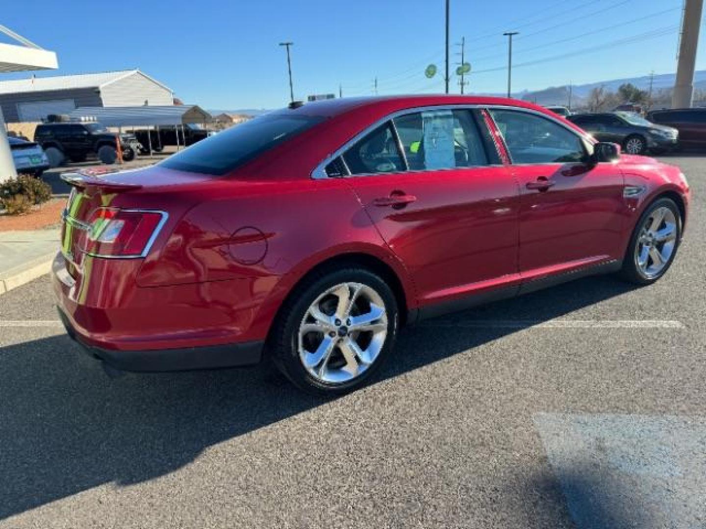 2010 Candy Red Metallic Paint /Charcoal Black/Umber Leather Interior Ford Taurus SHO AWD (1FAHP2KT5AG) with an 3.5L V6 DOHC 24V engine, 6-Speed Automatic transmission, located at 940 North Main Street, Cedar City, UT, 84720, (435) 628-0023, 37.692936, -113.061897 - Photo#11