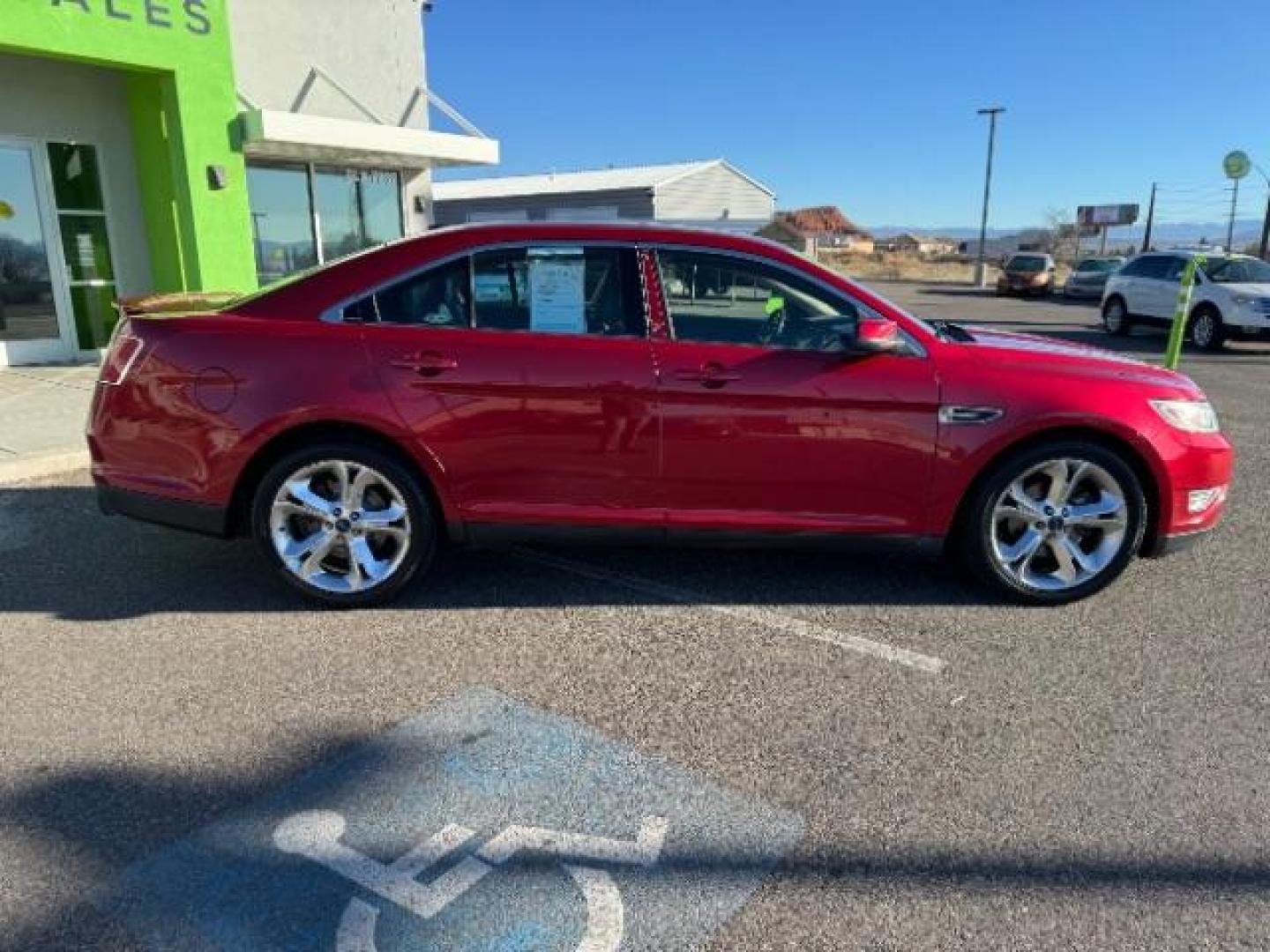 2010 Candy Red Metallic Paint /Charcoal Black/Umber Leather Interior Ford Taurus SHO AWD (1FAHP2KT5AG) with an 3.5L V6 DOHC 24V engine, 6-Speed Automatic transmission, located at 940 North Main Street, Cedar City, UT, 84720, (435) 628-0023, 37.692936, -113.061897 - Photo#12