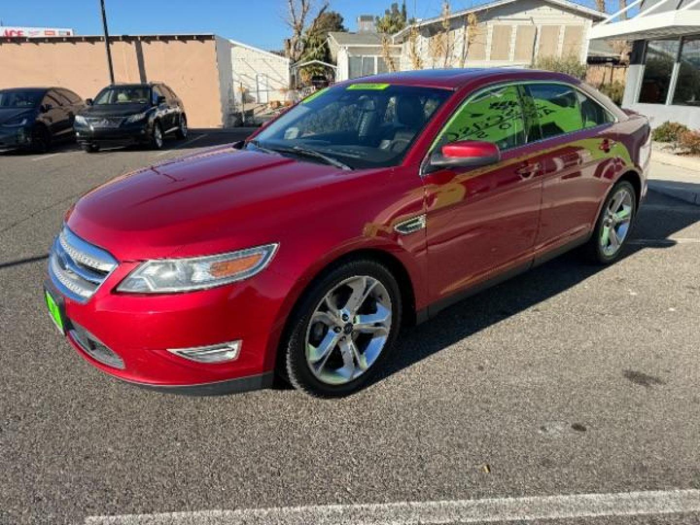 2010 Candy Red Metallic Paint /Charcoal Black/Umber Leather Interior Ford Taurus SHO AWD (1FAHP2KT5AG) with an 3.5L V6 DOHC 24V engine, 6-Speed Automatic transmission, located at 940 North Main Street, Cedar City, UT, 84720, (435) 628-0023, 37.692936, -113.061897 - Photo#4