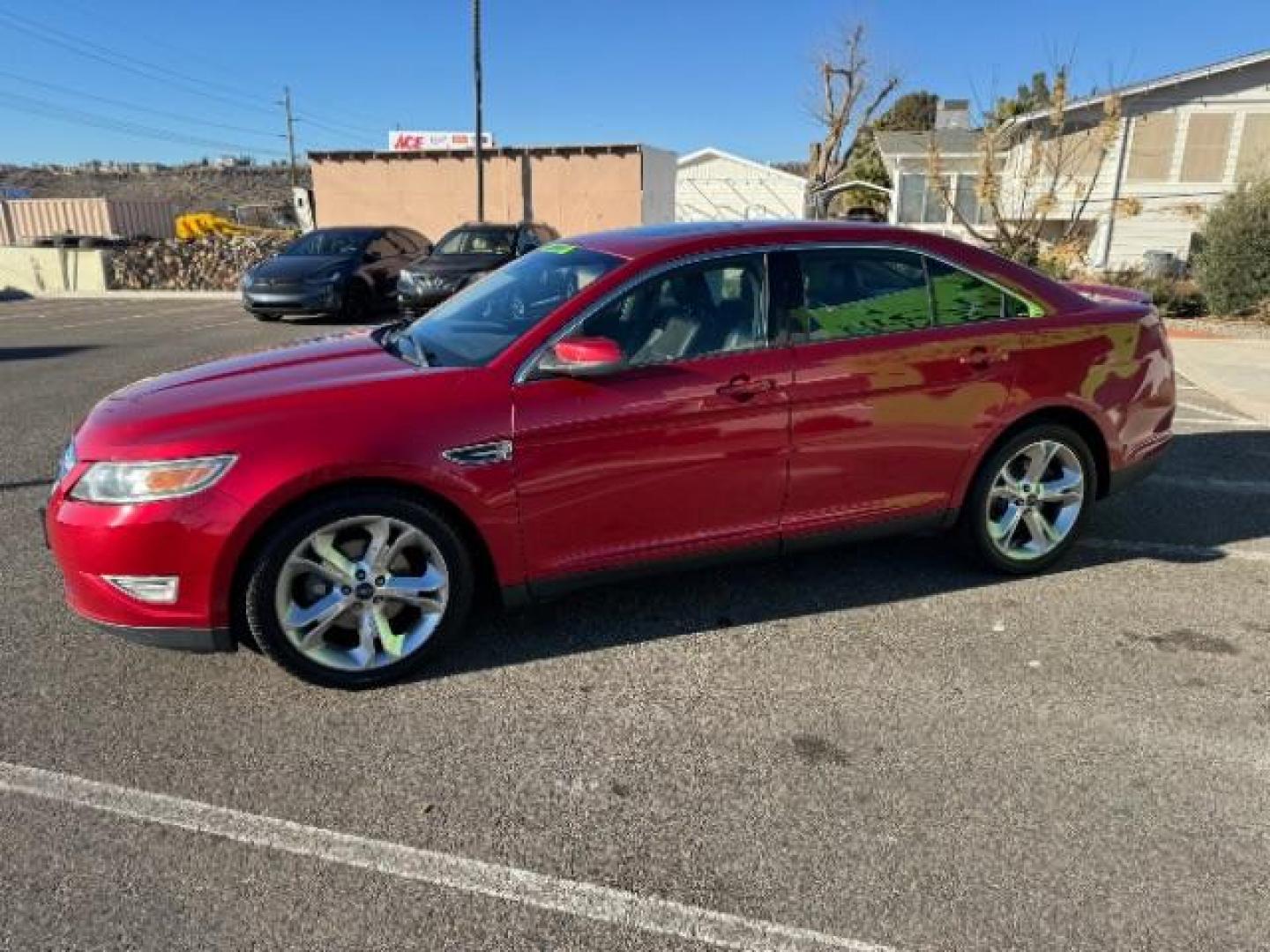 2010 Candy Red Metallic Paint /Charcoal Black/Umber Leather Interior Ford Taurus SHO AWD (1FAHP2KT5AG) with an 3.5L V6 DOHC 24V engine, 6-Speed Automatic transmission, located at 940 North Main Street, Cedar City, UT, 84720, (435) 628-0023, 37.692936, -113.061897 - Photo#5