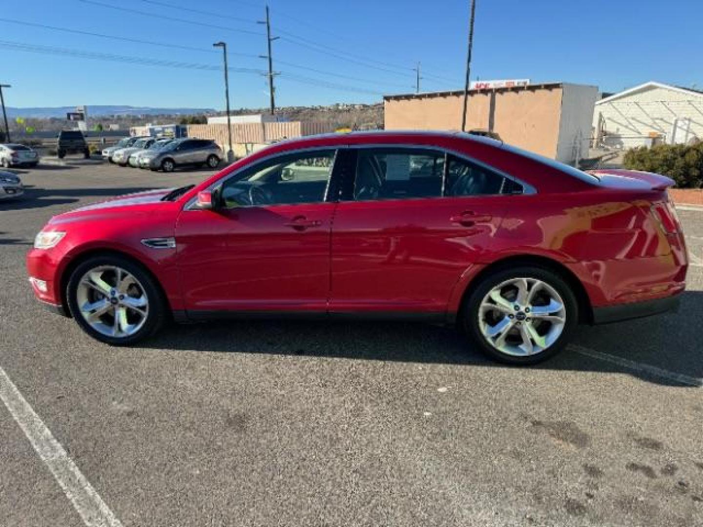 2010 Candy Red Metallic Paint /Charcoal Black/Umber Leather Interior Ford Taurus SHO AWD (1FAHP2KT5AG) with an 3.5L V6 DOHC 24V engine, 6-Speed Automatic transmission, located at 940 North Main Street, Cedar City, UT, 84720, (435) 628-0023, 37.692936, -113.061897 - Photo#6