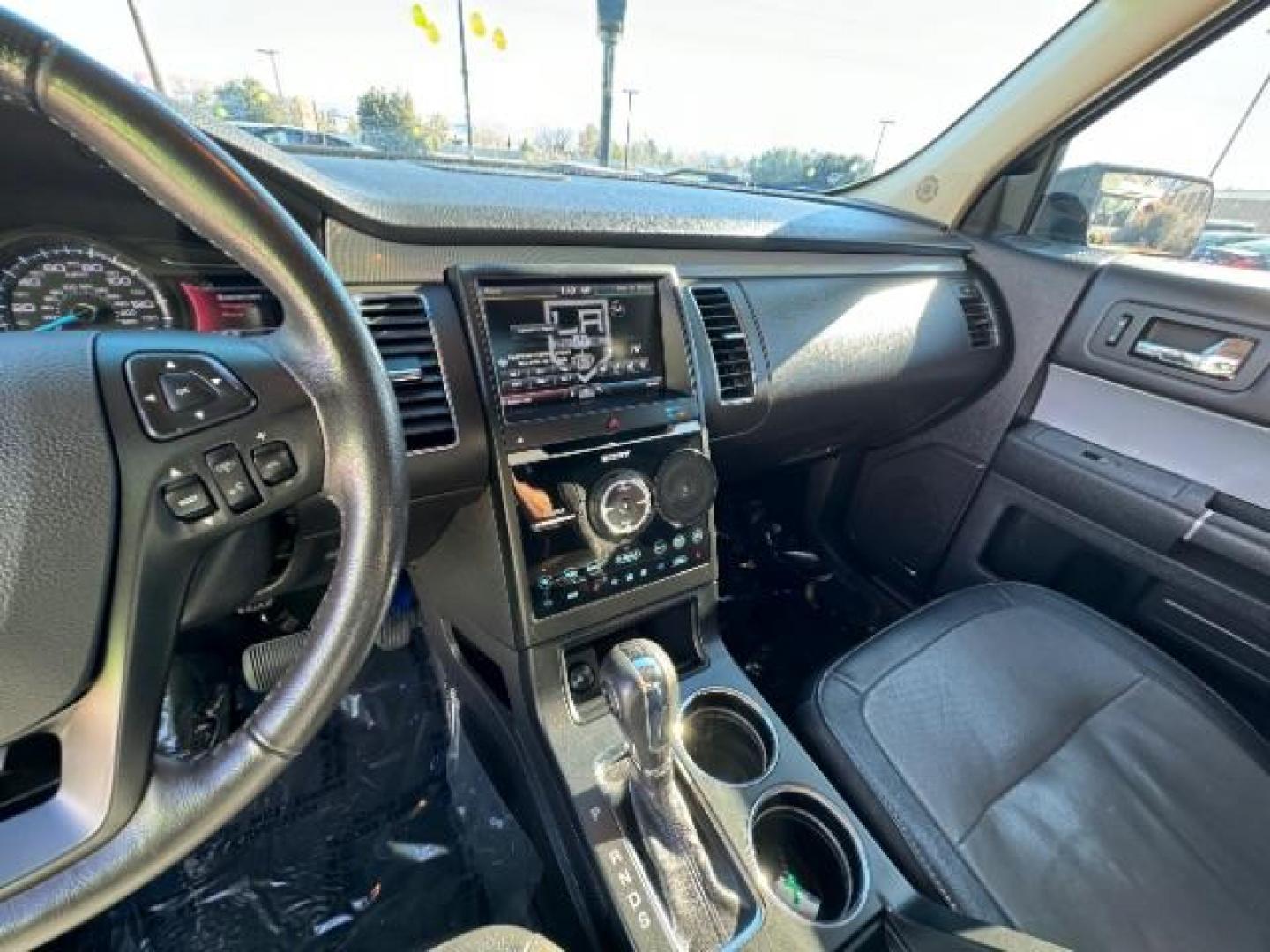 2014 Tuxedo Black Metallic /Charcoal Black Ford Flex Limited FWD (2FMGK5D8XEB) with an 3.5L V6 DOHC 24V engine, 6-Speed Automatic Overdrive transmission, located at 1865 East Red Hills Pkwy, St. George, 84770, (435) 628-0023, 37.120850, -113.543640 - We specialize in helping ALL people get the best financing available. No matter your credit score, good, bad or none we can get you an amazing rate. Had a bankruptcy, divorce, or repossessions? We give you the green light to get your credit back on the road. Low down and affordable payments that fit - Photo#20