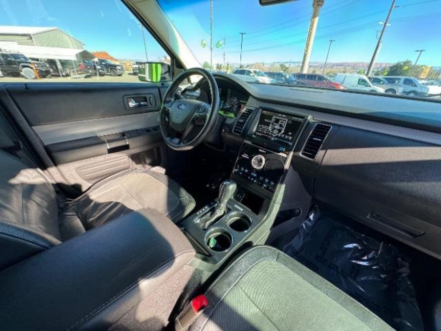 2014 Tuxedo Black Metallic /Charcoal Black Ford Flex Limited FWD (2FMGK5D8XEB) with an 3.5L V6 DOHC 24V engine, 6-Speed Automatic Overdrive transmission, located at 1865 East Red Hills Pkwy, St. George, 84770, (435) 628-0023, 37.120850, -113.543640 - We specialize in helping ALL people get the best financing available. No matter your credit score, good, bad or none we can get you an amazing rate. Had a bankruptcy, divorce, or repossessions? We give you the green light to get your credit back on the road. Low down and affordable payments that fit - Photo#46