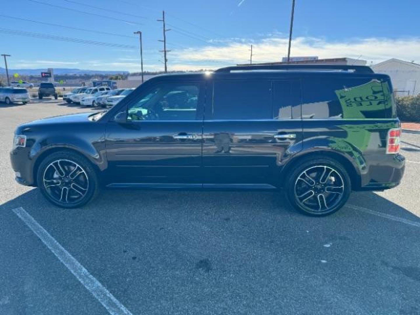 2014 Tuxedo Black Metallic /Charcoal Black Ford Flex Limited FWD (2FMGK5D8XEB) with an 3.5L V6 DOHC 24V engine, 6-Speed Automatic Overdrive transmission, located at 1865 East Red Hills Pkwy, St. George, 84770, (435) 628-0023, 37.120850, -113.543640 - We specialize in helping ALL people get the best financing available. No matter your credit score, good, bad or none we can get you an amazing rate. Had a bankruptcy, divorce, or repossessions? We give you the green light to get your credit back on the road. Low down and affordable payments that fit - Photo#5