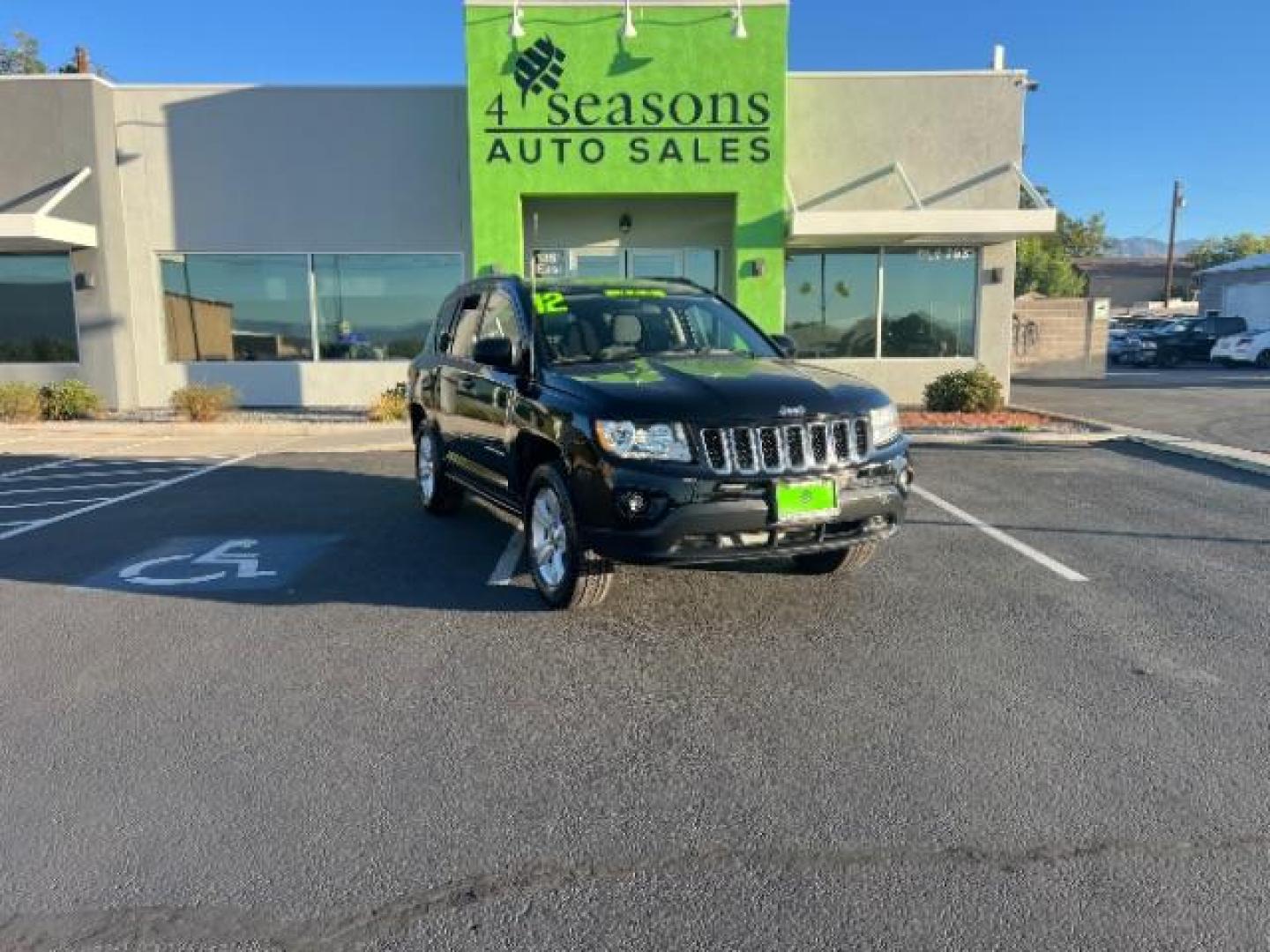 2012 Black /Dark Slate Gray Clot Jeep Compass Sport 4WD (1C4NJDBB2CD) with an 2.4L L4 DOHC 16V engine, Continuously Variabl transmission, located at 940 North Main Street, Cedar City, UT, 84720, (435) 628-0023, 37.692936, -113.061897 - We specialize in helping ALL people get the best financing available. No matter your credit score, good, bad or none we can get you an amazing rate. Had a bankruptcy, divorce, or repossessions? We give you the green light to get your credit back on the road. Low down and affordable payments that fit - Photo#0