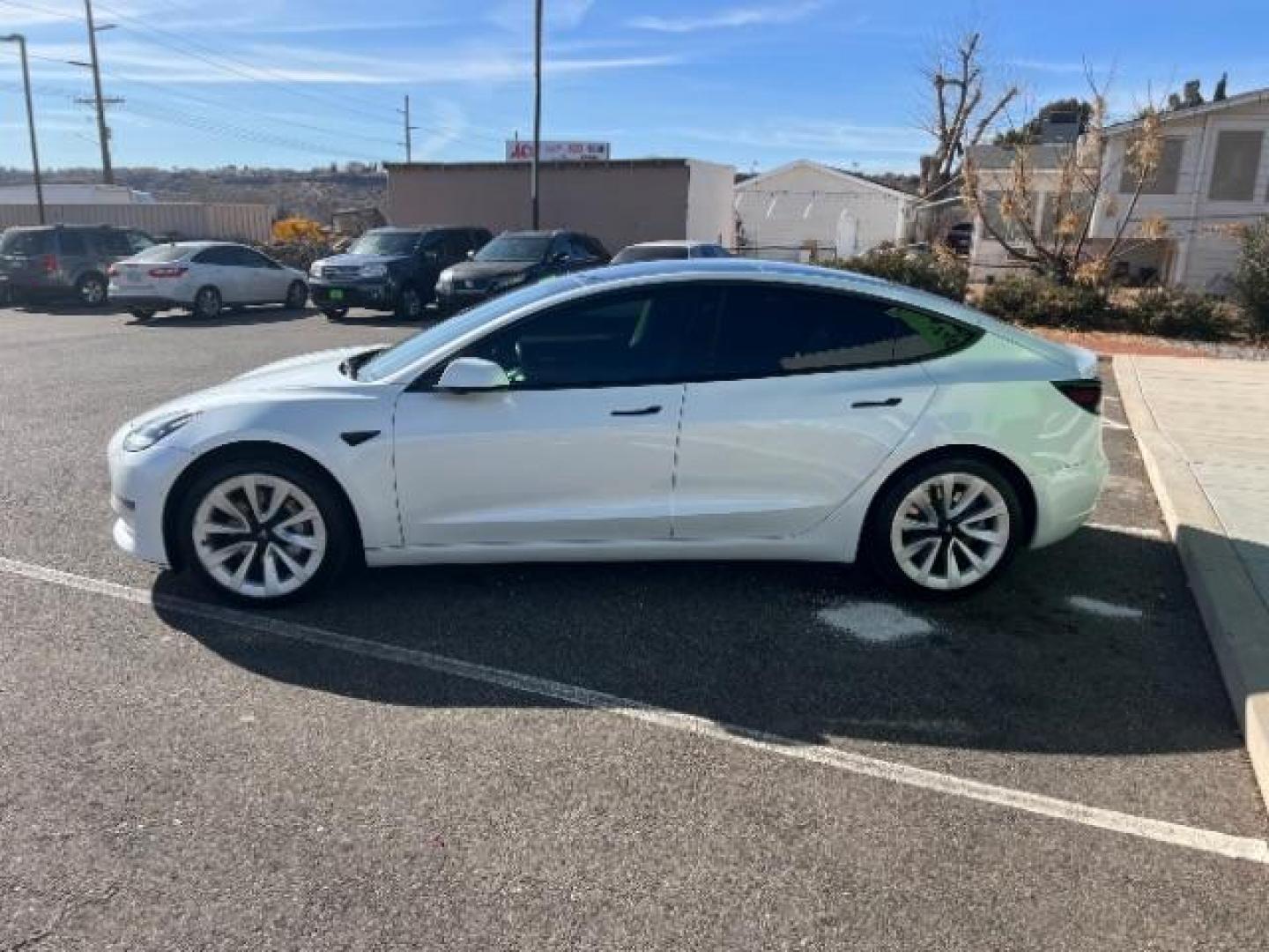 2021 Pearl White Multi-Coat /All Black Tesla Model 3 Standard Range Plus (5YJ3E1EA1MF) with an ELECTRIC engine, 1-Speed Automatic transmission, located at 1865 East Red Hills Pkwy, St. George, 84770, (435) 628-0023, 37.120850, -113.543640 - Photo#3