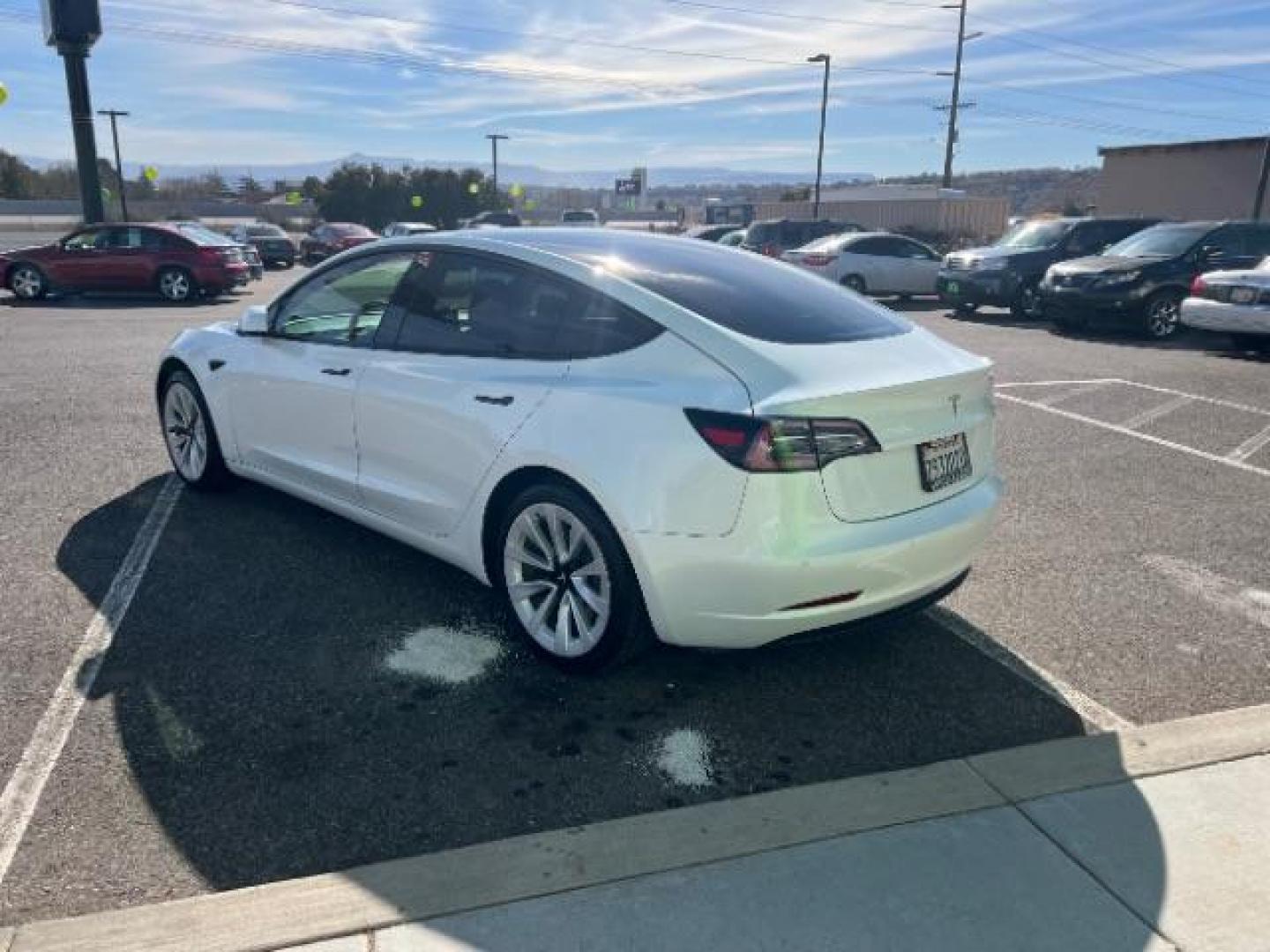 2021 Pearl White Multi-Coat /All Black Tesla Model 3 Standard Range Plus (5YJ3E1EA1MF) with an ELECTRIC engine, 1-Speed Automatic transmission, located at 1865 East Red Hills Pkwy, St. George, 84770, (435) 628-0023, 37.120850, -113.543640 - Photo#4