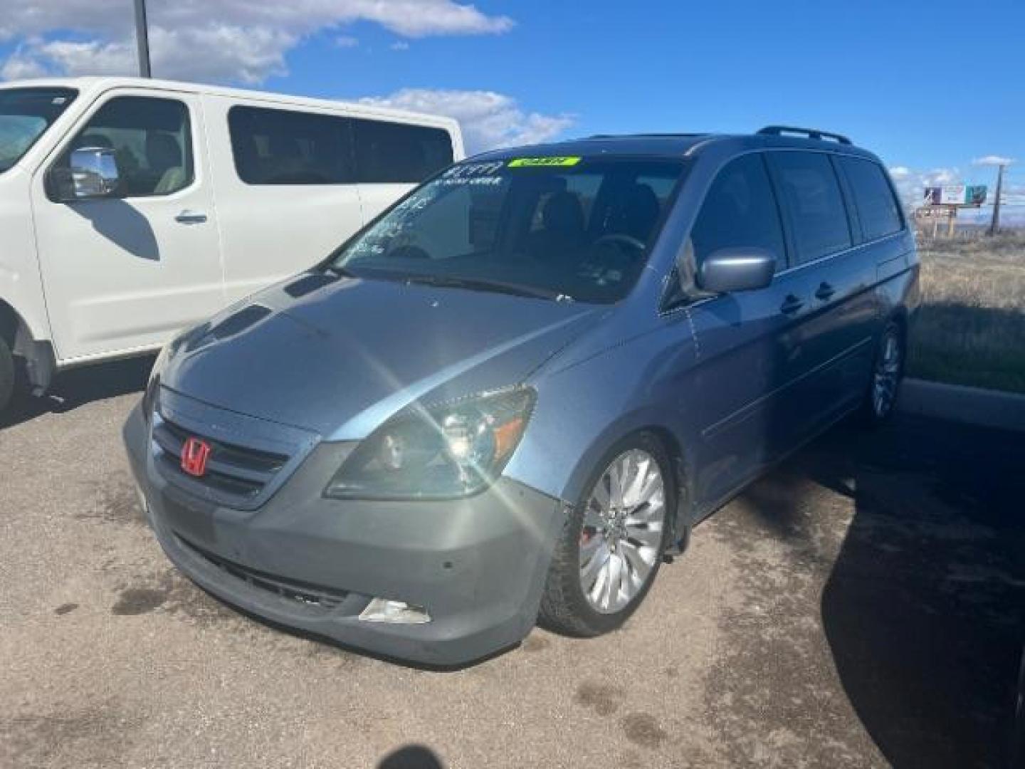 2005 Ocean Mist Metallic Honda Odyssey EX w/ Leather DVD (5FNRL38765B) with an 3.5L V6 SOHC 24V engine, 5-Speed Automatic transmission, located at 1865 East Red Hills Pkwy, St. George, 84770, (435) 628-0023, 37.120850, -113.543640 - Photo#0