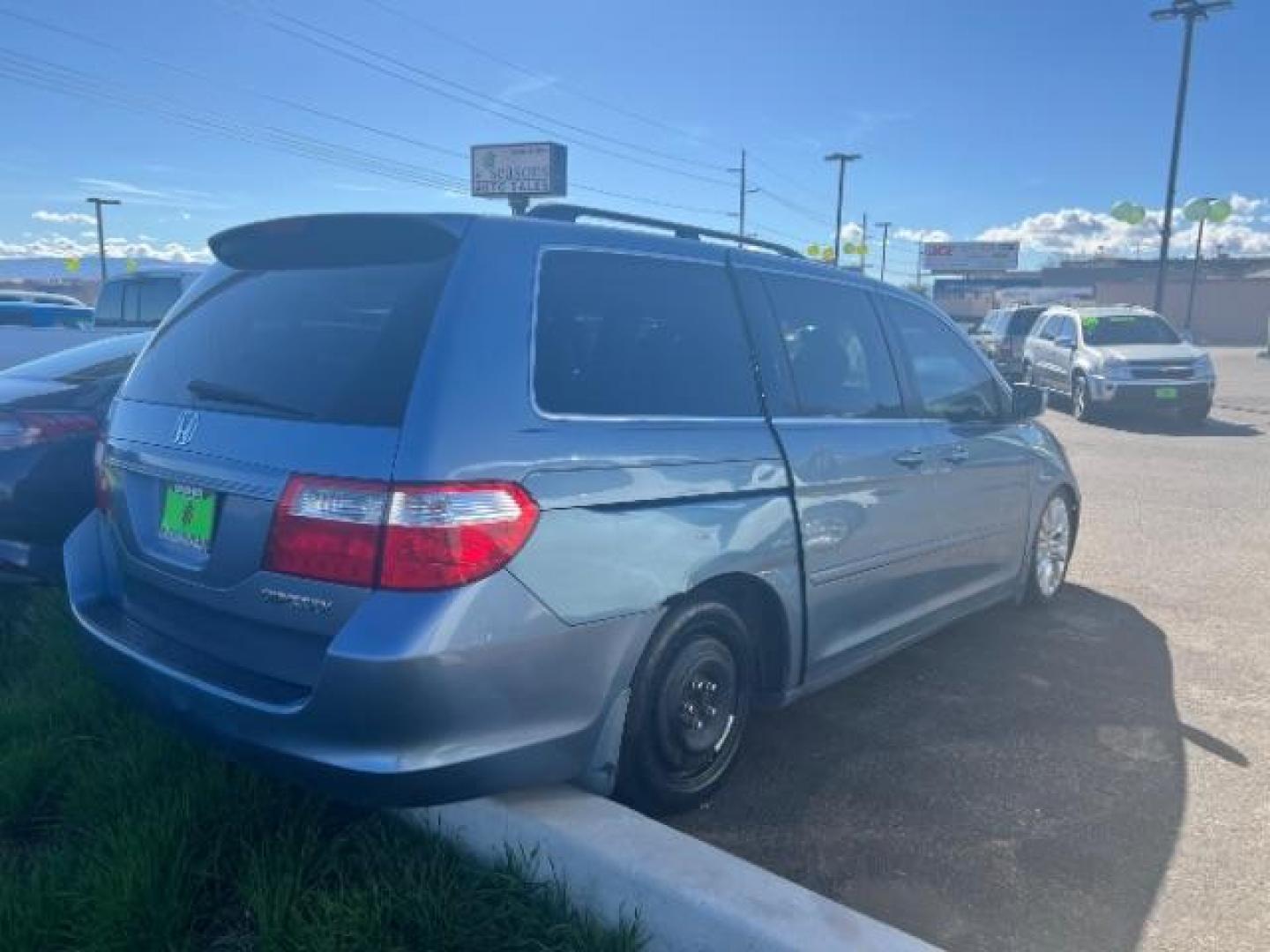 2005 Ocean Mist Metallic Honda Odyssey EX w/ Leather DVD (5FNRL38765B) with an 3.5L V6 SOHC 24V engine, 5-Speed Automatic transmission, located at 1865 East Red Hills Pkwy, St. George, 84770, (435) 628-0023, 37.120850, -113.543640 - Photo#3