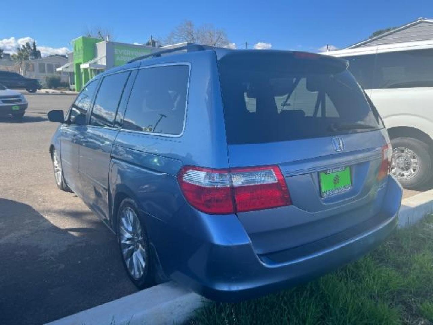 2005 Ocean Mist Metallic Honda Odyssey EX w/ Leather DVD (5FNRL38765B) with an 3.5L V6 SOHC 24V engine, 5-Speed Automatic transmission, located at 1865 East Red Hills Pkwy, St. George, 84770, (435) 628-0023, 37.120850, -113.543640 - Photo#5