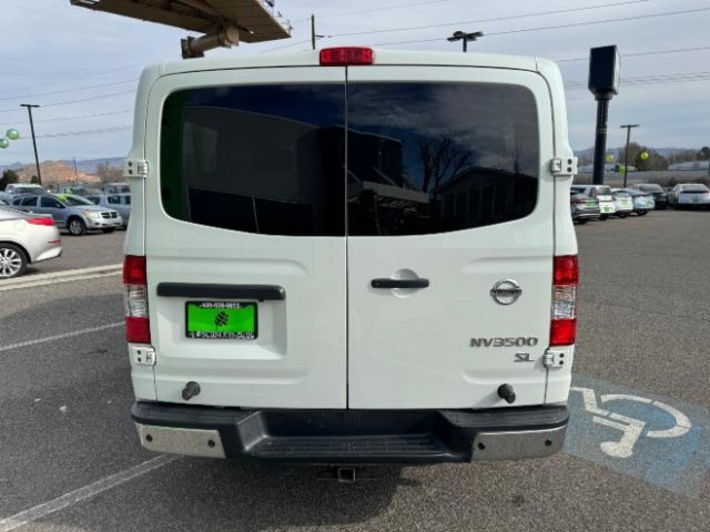 2018 Glacier White /Beige, leather Nissan NV Passenger 3500 SL V8 (5BZAF0AA5JN) with an 5.6L V8 engine, 5-Speed Automatic transmission, located at 1865 East Red Hills Pkwy, St. George, 84770, (435) 628-0023, 37.120850, -113.543640 - Photo#9