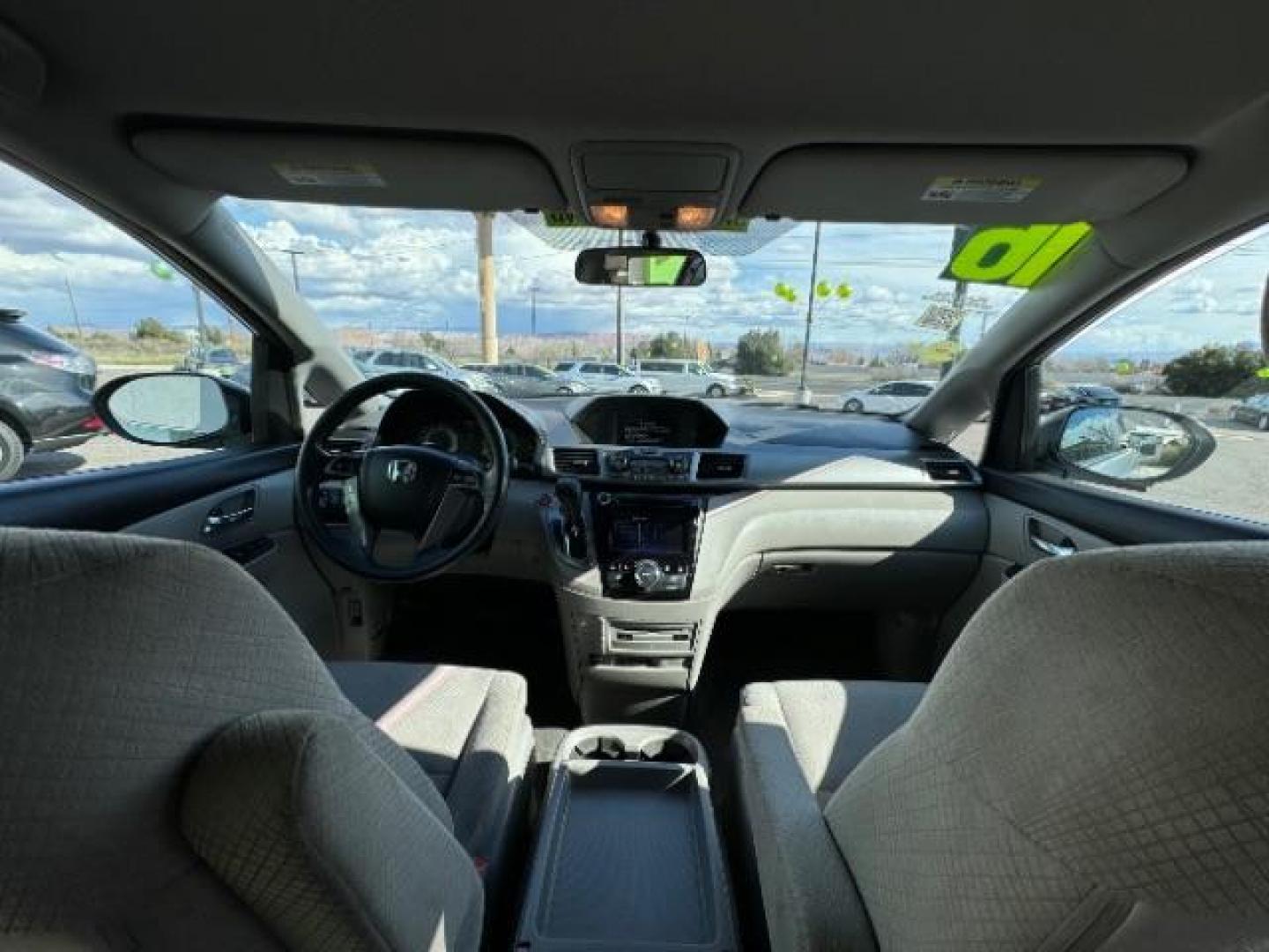 2016 Lunar Silver Metallic /Gray, cloth Honda Odyssey SE (5FNRL5H30GB) with an 3.5L V6 SOHC 24V engine, 6-Speed Automatic transmission, located at 940 North Main Street, Cedar City, UT, 84720, (435) 628-0023, 37.692936, -113.061897 - Photo#27