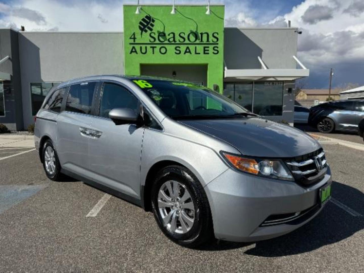 2016 Lunar Silver Metallic /Gray, cloth Honda Odyssey SE (5FNRL5H30GB) with an 3.5L V6 SOHC 24V engine, 6-Speed Automatic transmission, located at 940 North Main Street, Cedar City, UT, 84720, (435) 628-0023, 37.692936, -113.061897 - Photo#0