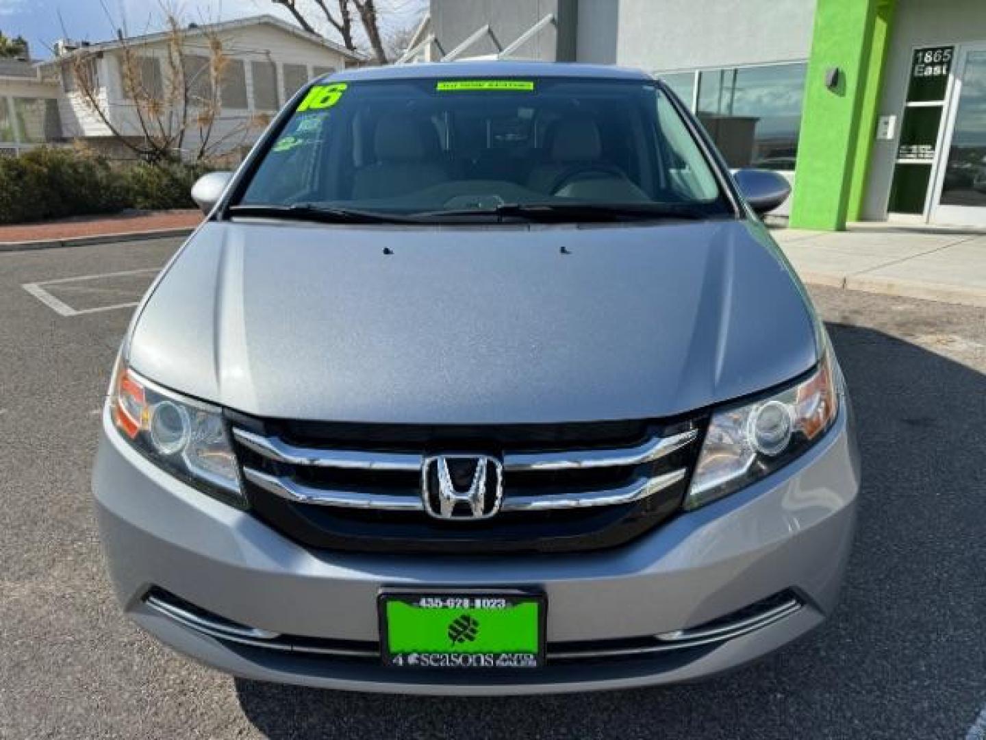 2016 Lunar Silver Metallic /Gray, cloth Honda Odyssey SE (5FNRL5H30GB) with an 3.5L V6 SOHC 24V engine, 6-Speed Automatic transmission, located at 940 North Main Street, Cedar City, UT, 84720, (435) 628-0023, 37.692936, -113.061897 - Photo#2