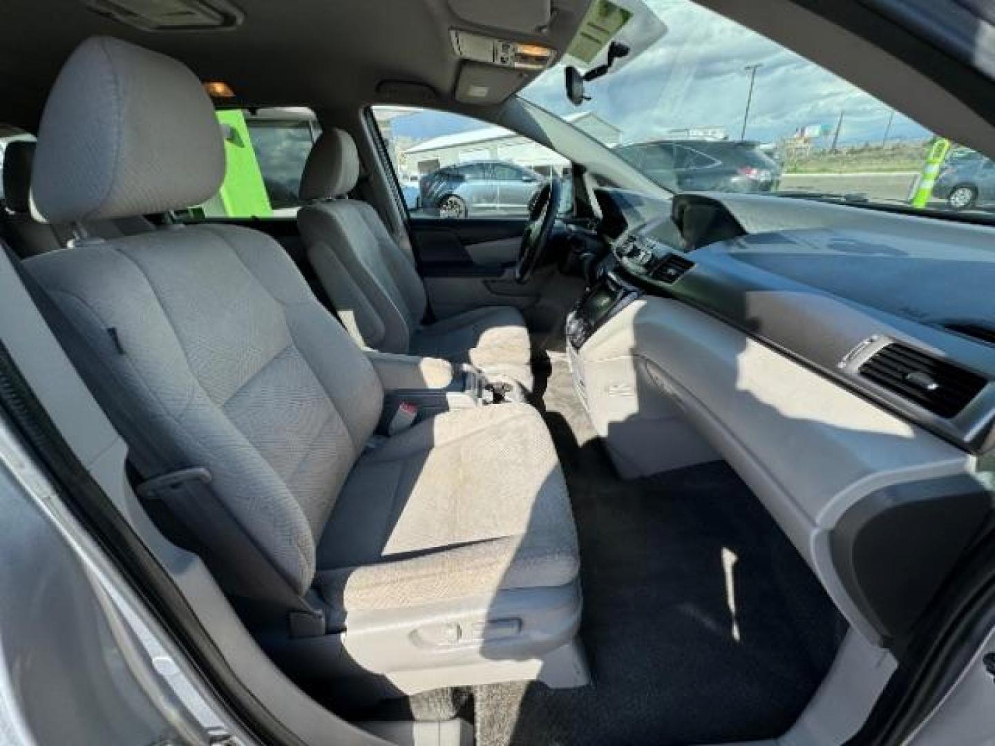 2016 Lunar Silver Metallic /Gray, cloth Honda Odyssey SE (5FNRL5H30GB) with an 3.5L V6 SOHC 24V engine, 6-Speed Automatic transmission, located at 940 North Main Street, Cedar City, UT, 84720, (435) 628-0023, 37.692936, -113.061897 - Photo#35